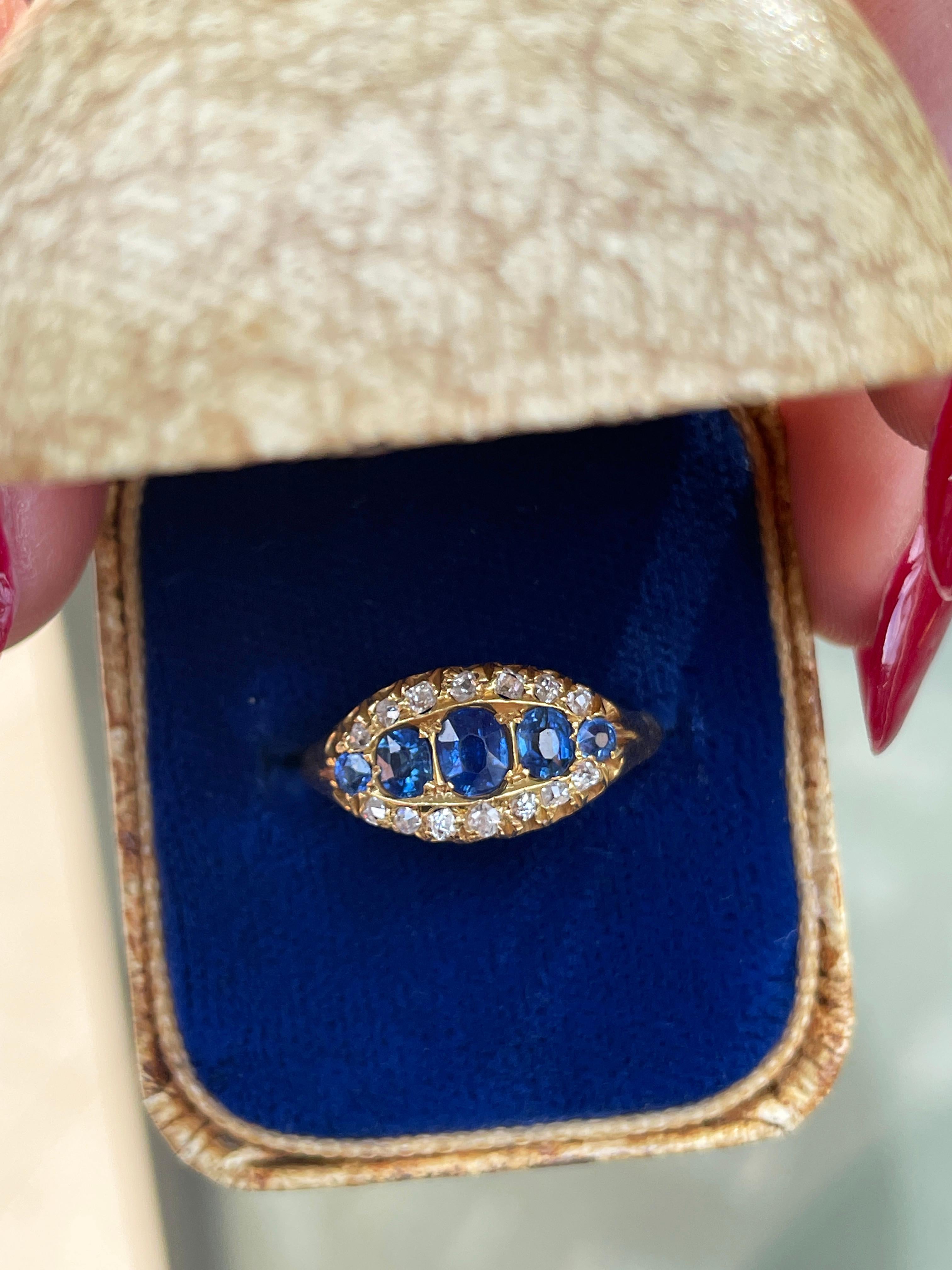 Oval Cut Antique Blue Sapphire and Old Cut Diamond 18 Carat Yellow Gold Ring, Circa 1890s For Sale