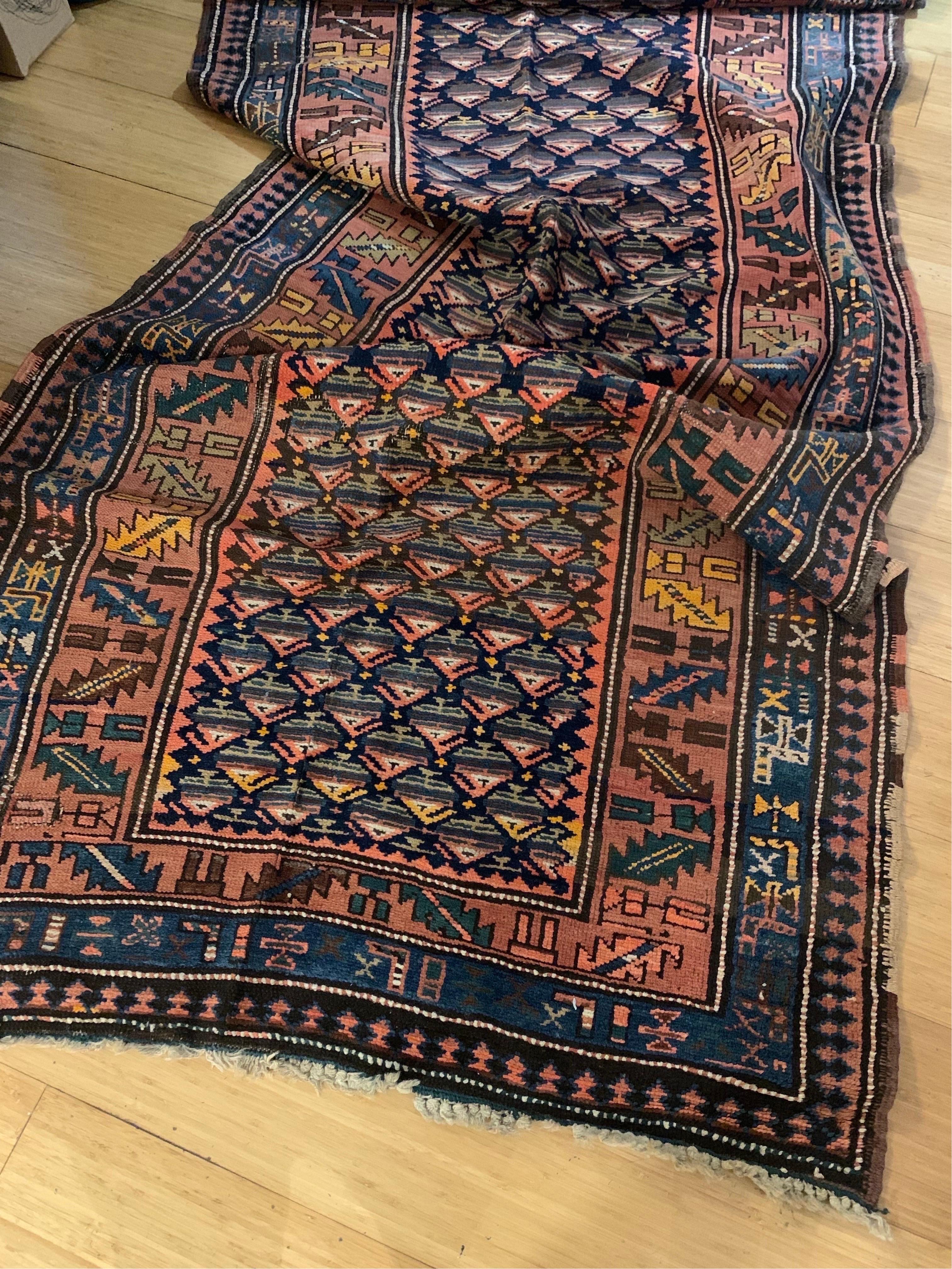 This lovely antique West Persian Kurd runner measures 3.10 x 10.5 ft.