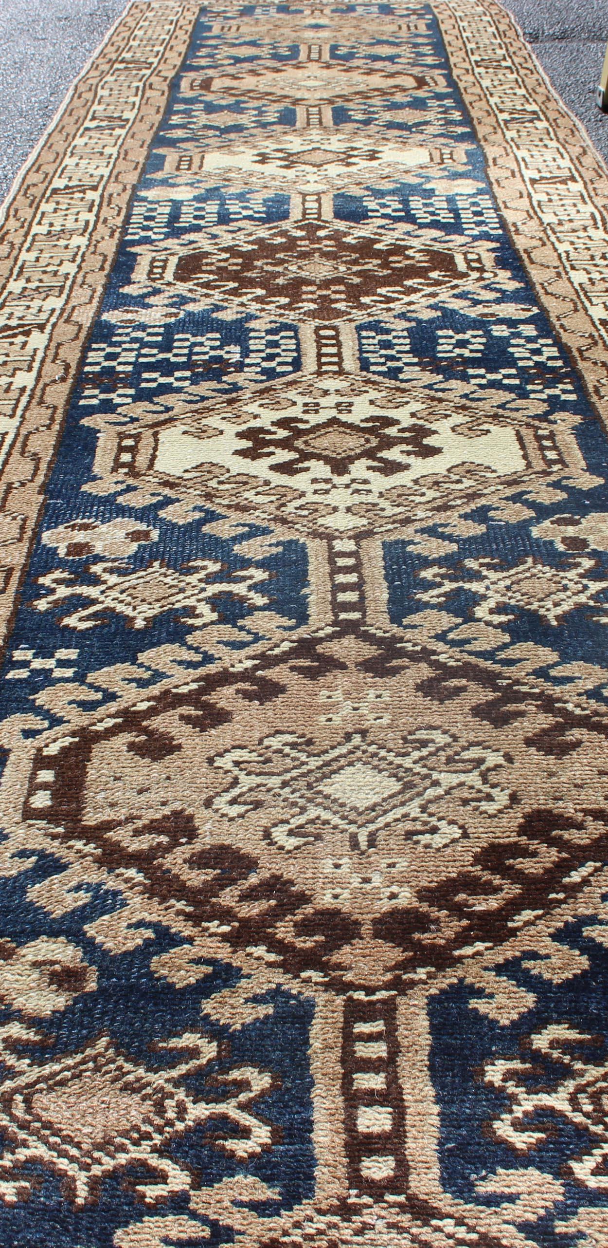 Antique Blue Tribal Karajeh Runner With Navy Blue, Brown and Earth Tones In Good Condition For Sale In Atlanta, GA