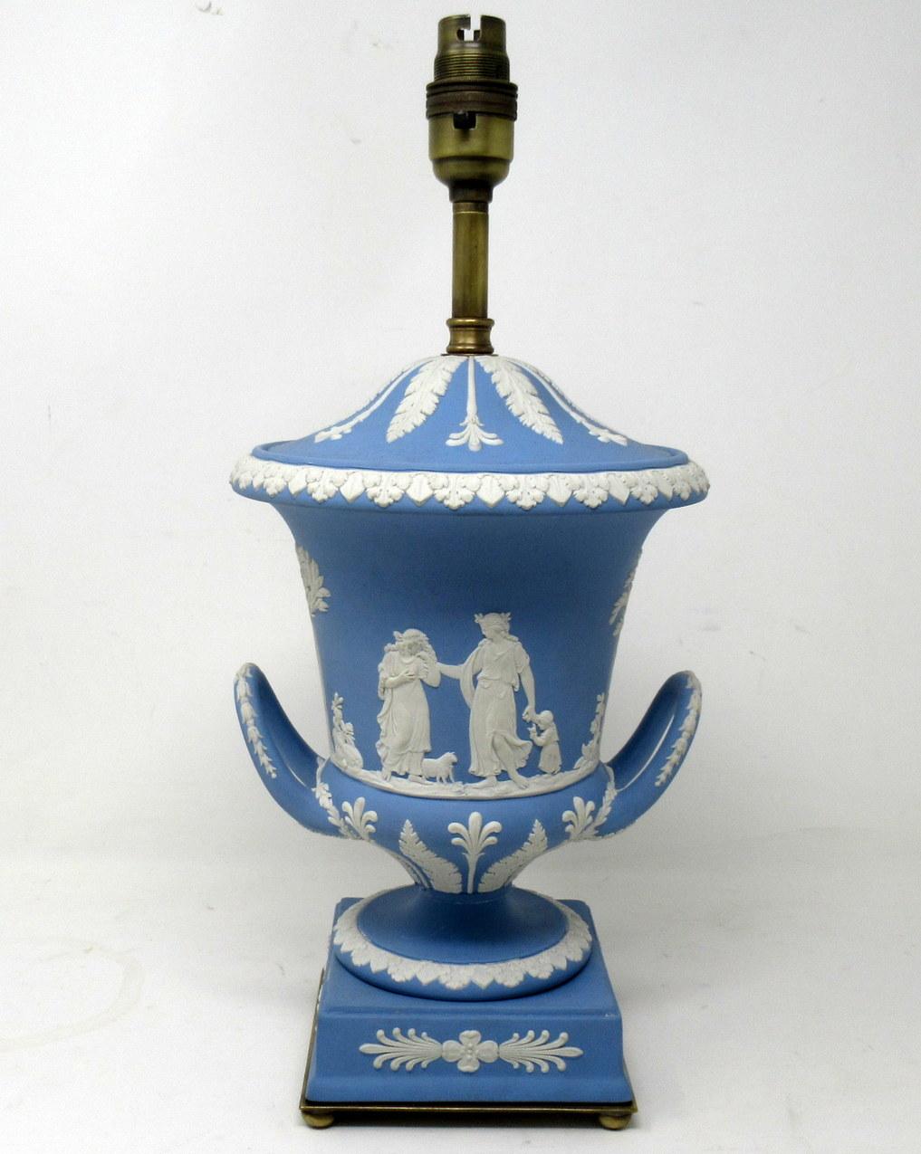 An exceptionally fine example of a Single English Jasperware Wedgwood Urn of good size proportions, now converted to an electric table lamp. Mid twentieth century. 

The twin arched handle Campana form urn decorated in relief depicting