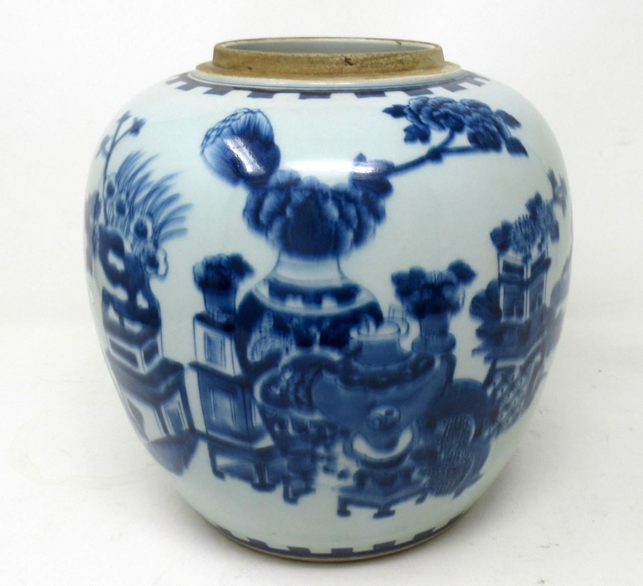 A very fine example of a Chinese Export Hand Decorated Blue and White Porcelain Ginger Jar of unusually large and heavy gauge proportions, superbly decorated depicting the hundred antiques pattern within upper and lower dental banded decoration.