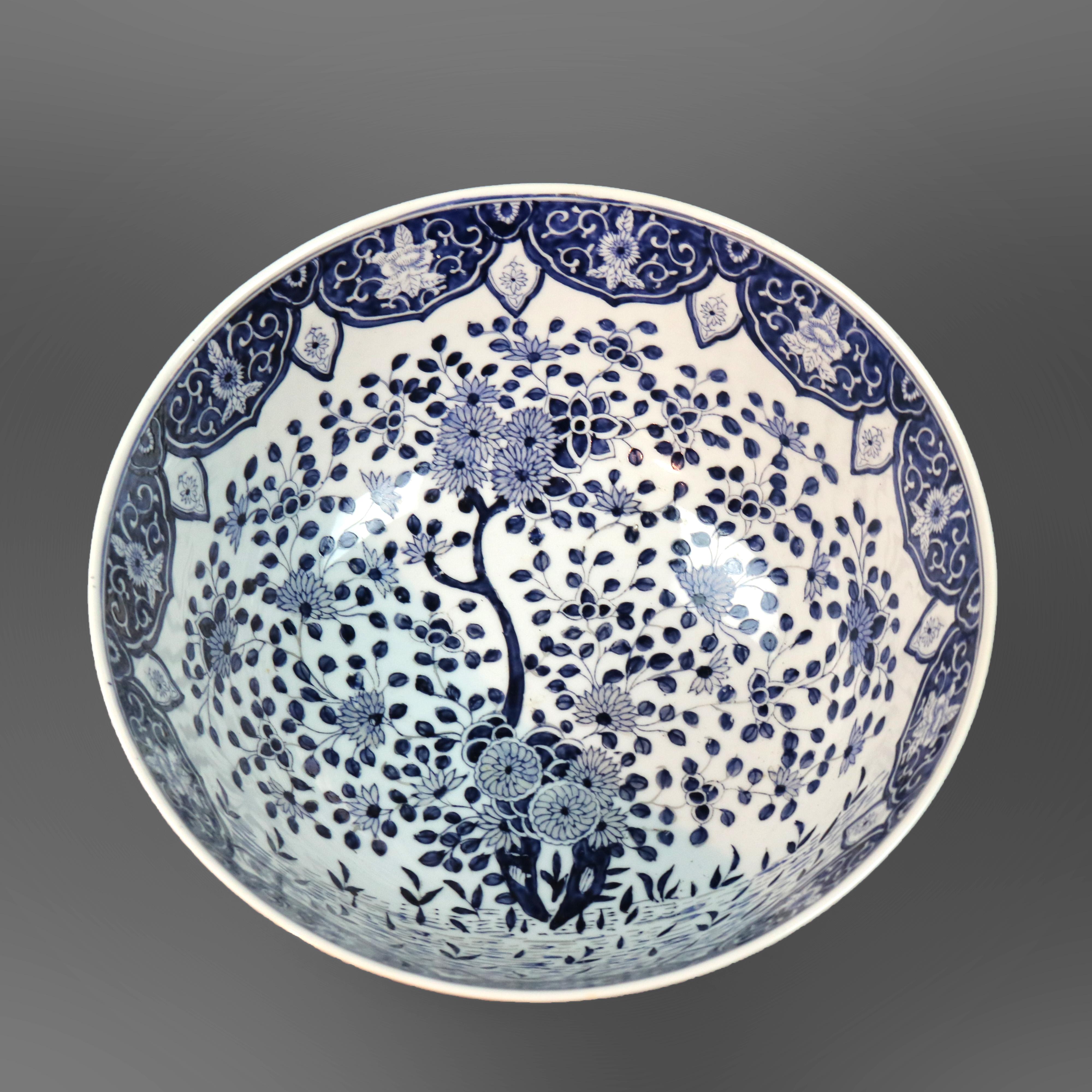 Carved Antique Blue and White Japanese Porcelain Bowl with Hardwood Stand, 20th Century