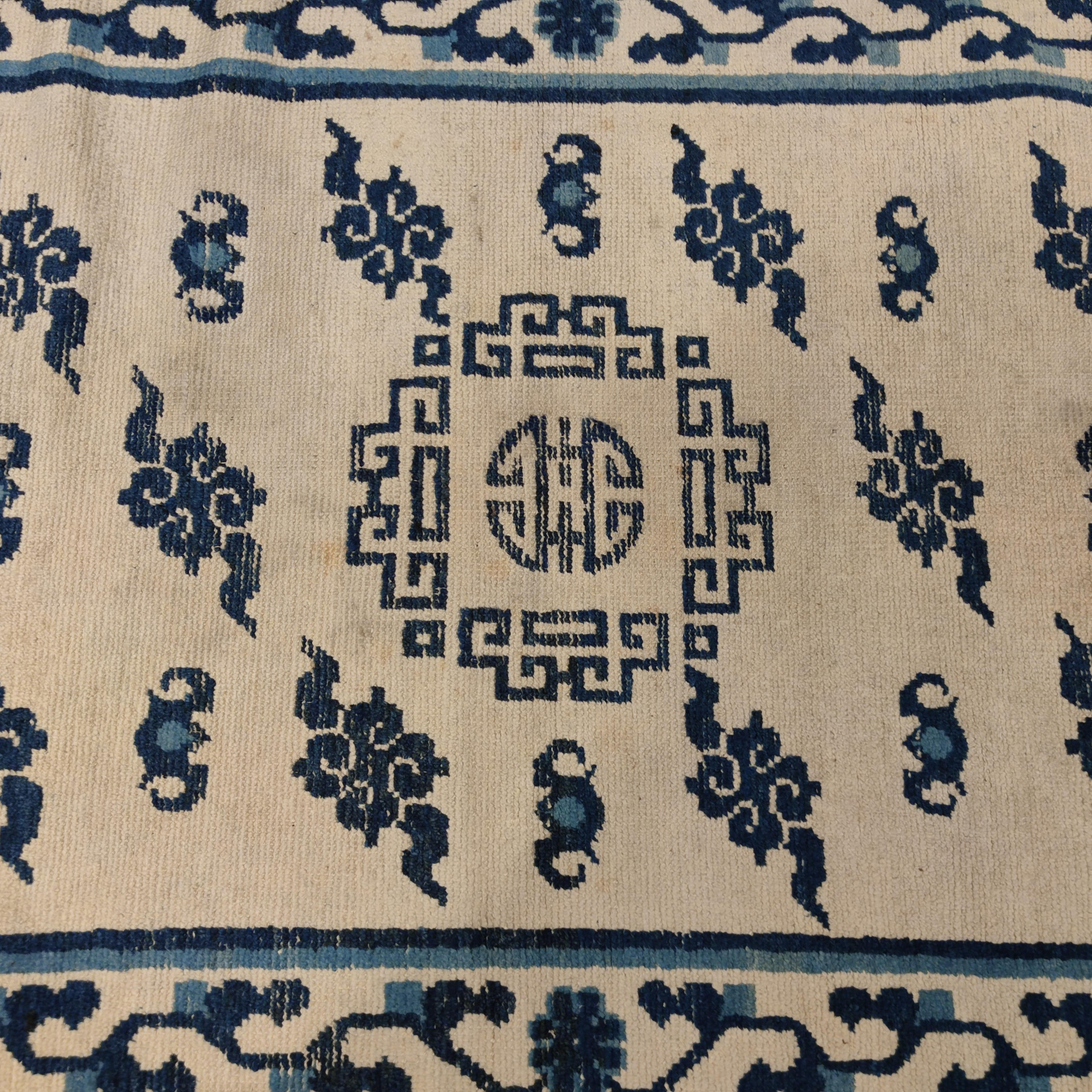 Hand-Knotted Antique Blue & White Mongolian Rug with Cloudbands and Longevity Symbols For Sale