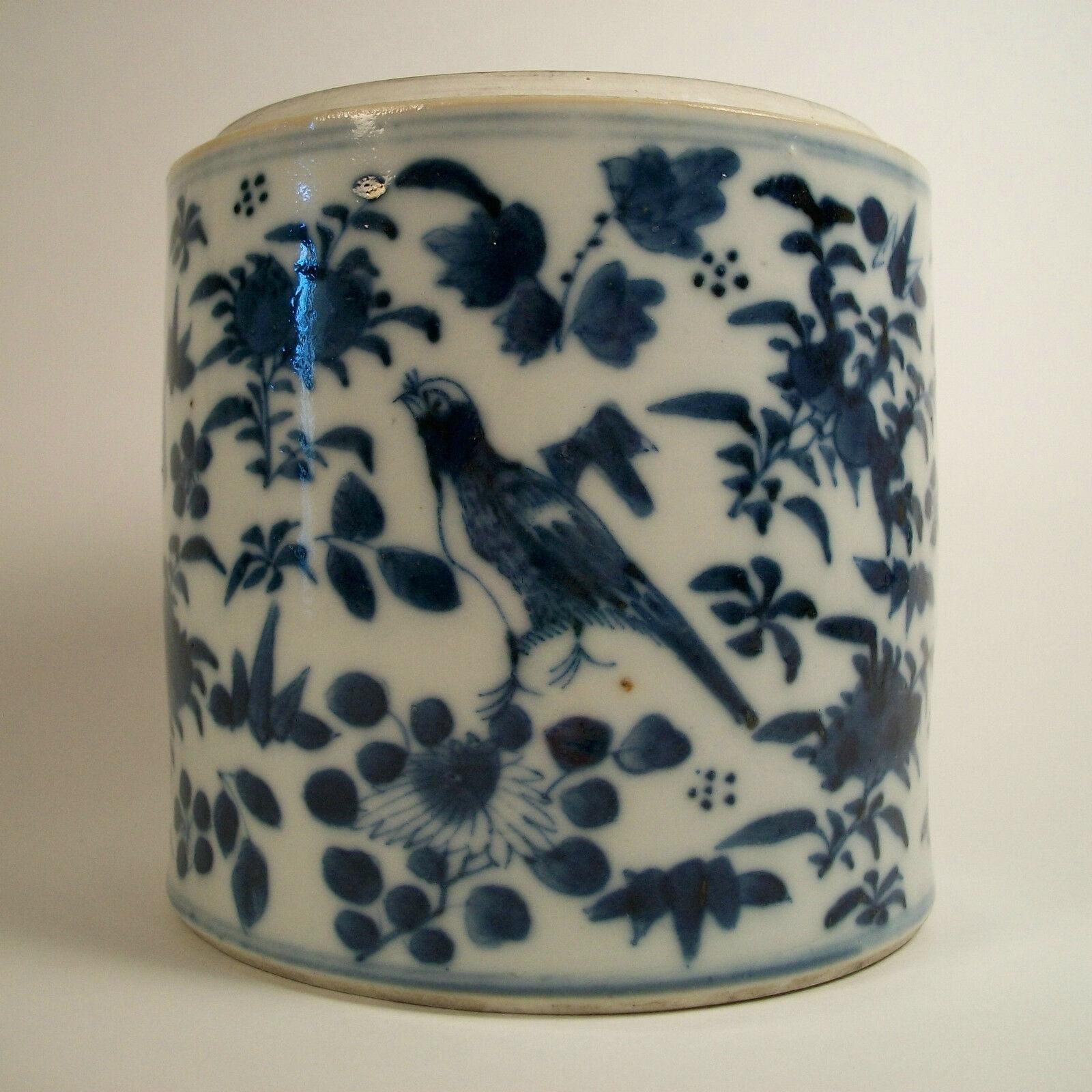 Antique blue and white porcelain tea caddy - hand painted in cobalt blue with birds and butterflies among flowering branches - non glazed lip and base rim - China - 19th century.

Fair antique condition - no lid - minor glaze chips to the rim -