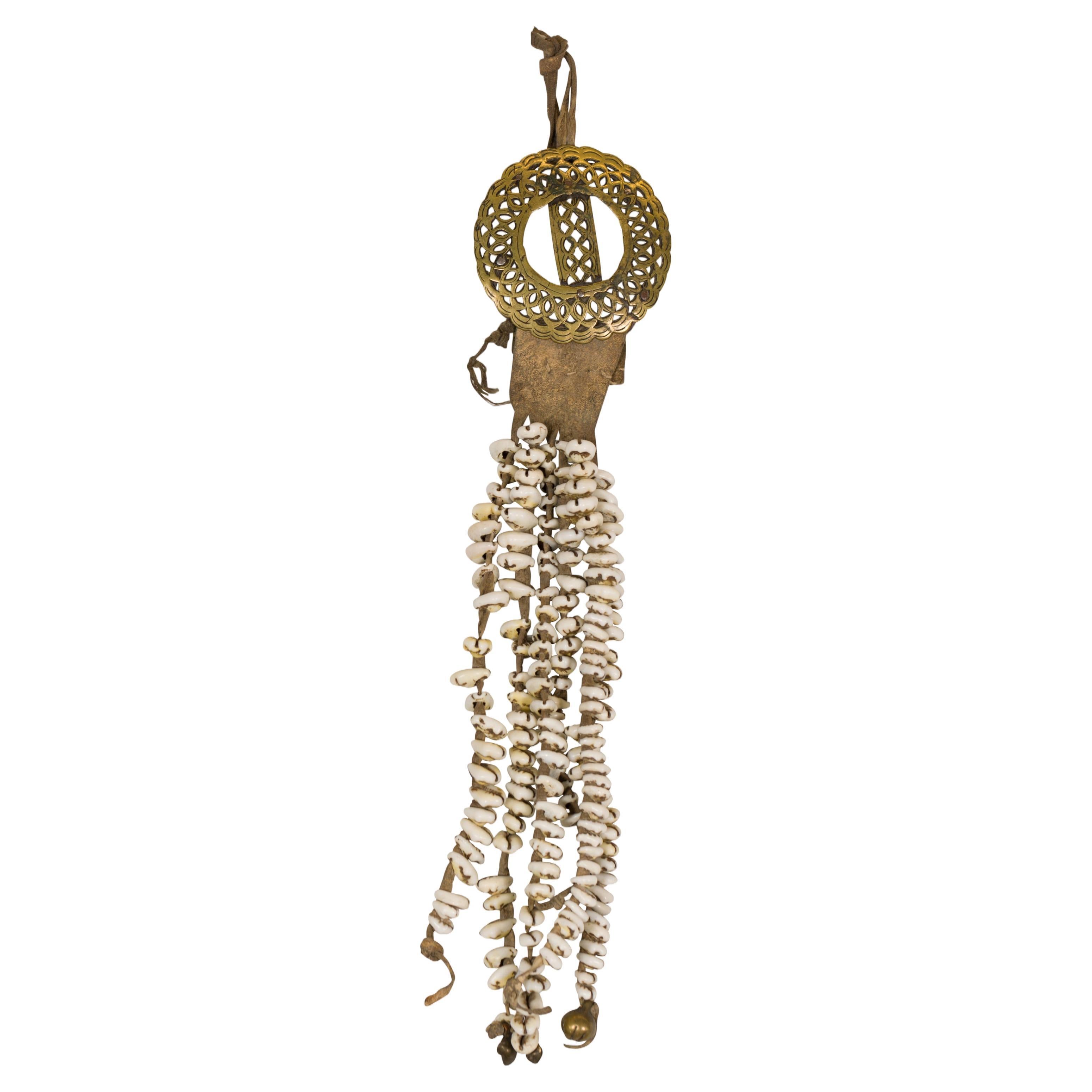 Antique Body Ornament Made of Himalayan Shells Secured to a Brass Buckle For Sale