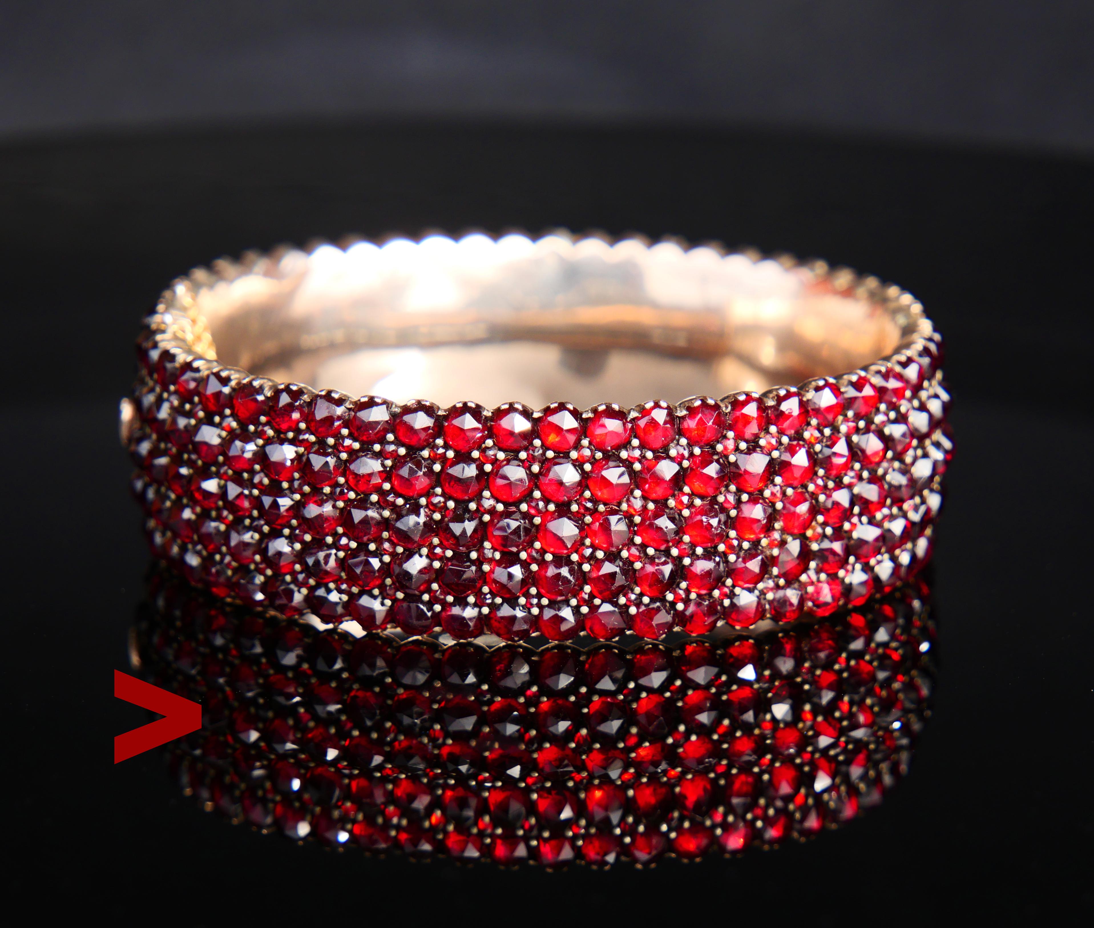 Handmade in Austria / Hungary or Bohemian bracelet, circa 1850 - early 1900s.
A great example of an old Austro-Hungarian jewelry-making School.

Deep rich red Bohemian rose cut Pyrope Garnets are set in Gilt Silver.

There are 120 stones involved,