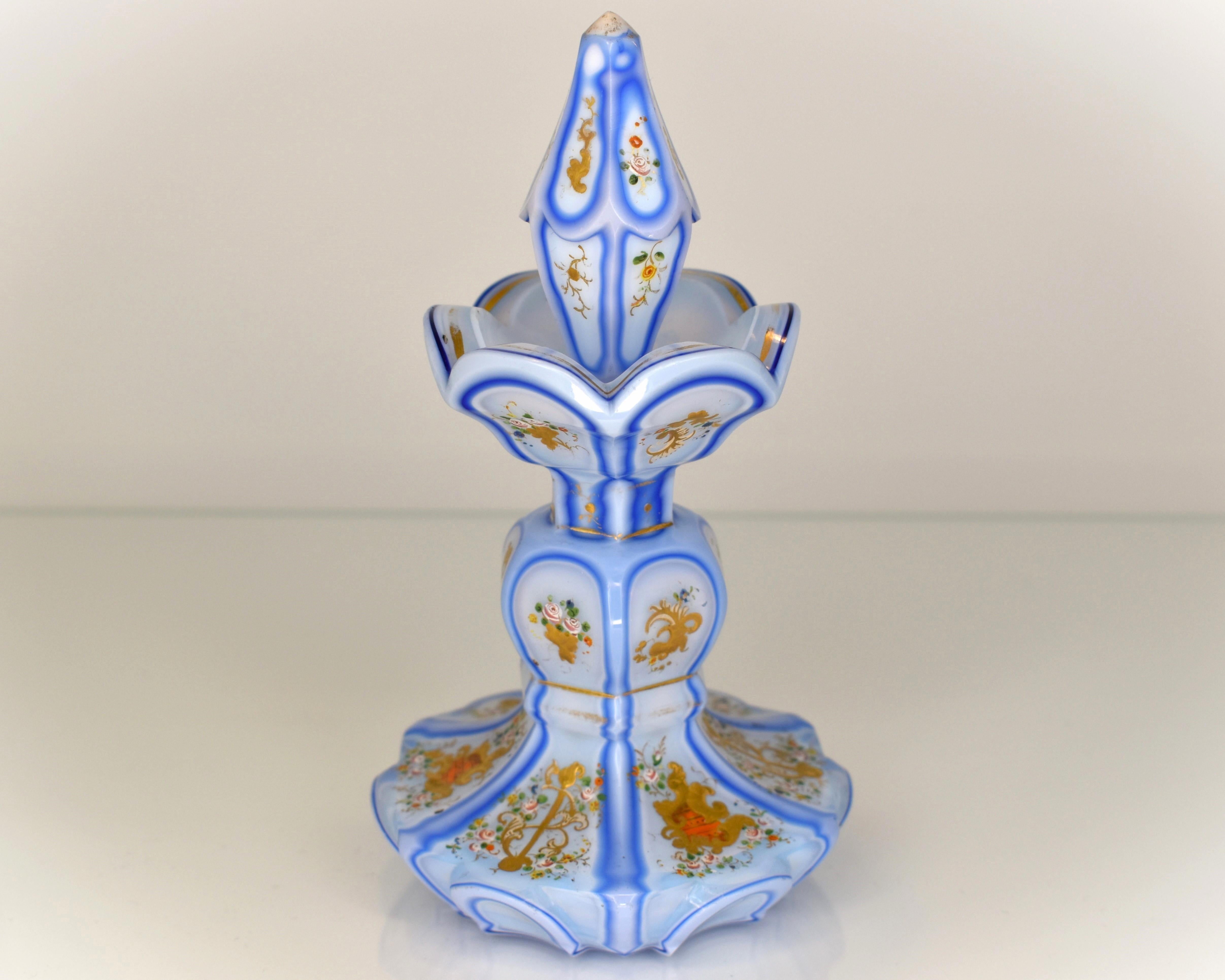 Exceptional Bohemian Opaline Glass Perfume Bottle

White Opaline Glass with Blue Overlay

Beautifully Cut and  Hand-painted with Colourful Enamel and Gilding Decoration   

Bohemia, 1850