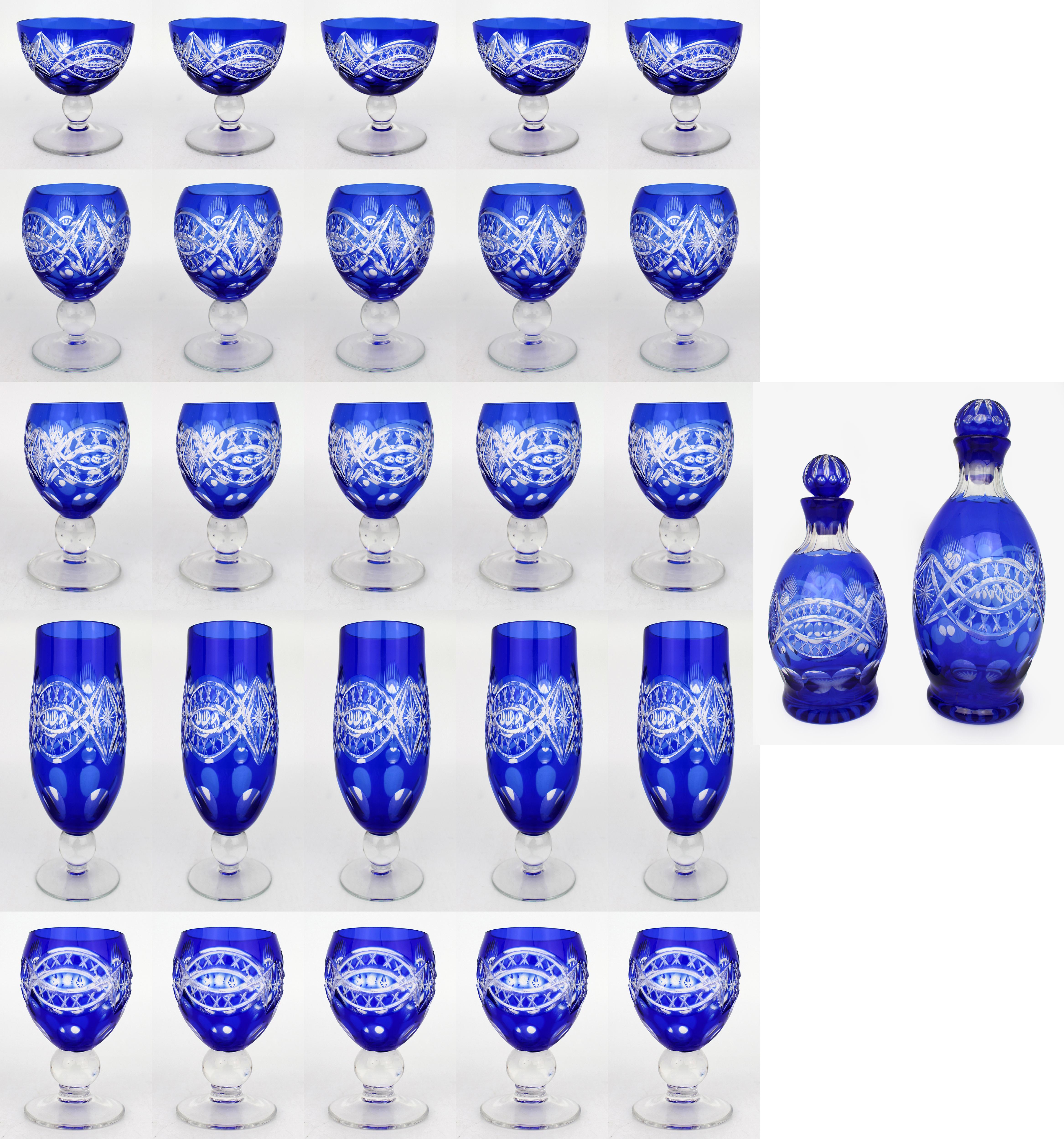 Antike böhmische Suite aus geschliffenem Kristall mit kobaltblauem Overlay, 27 Teile - CIRCA 1910
Eine seltene und vollständige böhmische Kristallgarnitur aus dem frühen 20. Jahrhundert in auffallend kobaltblauem Überfangglas. Dieses prächtige