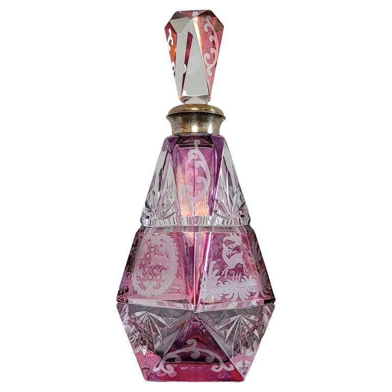 https://a.1stdibscdn.com/antique-bohemian-cranberry-cut-to-clear-crystal-decanter-for-sale/f_59772/f_316213321670358501593/f_31621332_1670358502690_bg_processed.jpg?width=768