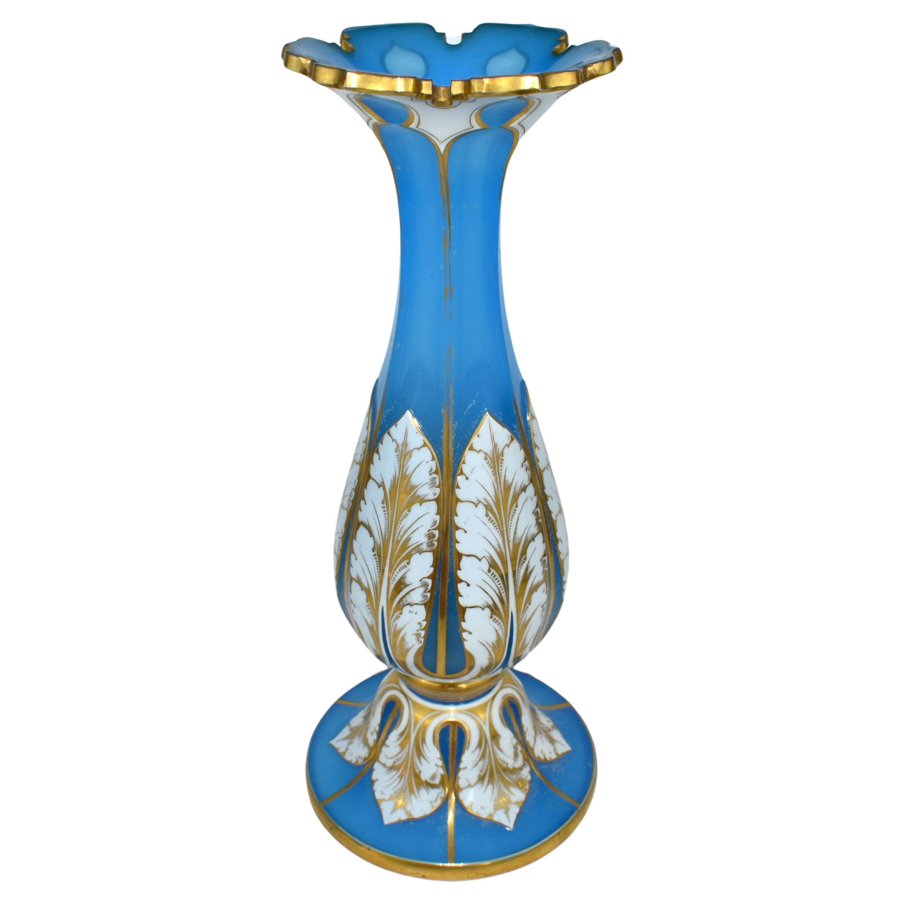 Exceptional Opaline Overlay Glass Vase, White Over Blue

Blue Opaline Overlaid with Milky White Opaline Glass

Cut Gilded Rim

Rich and Fine Gilding Decoration all around

Bohemia, circa 1860.