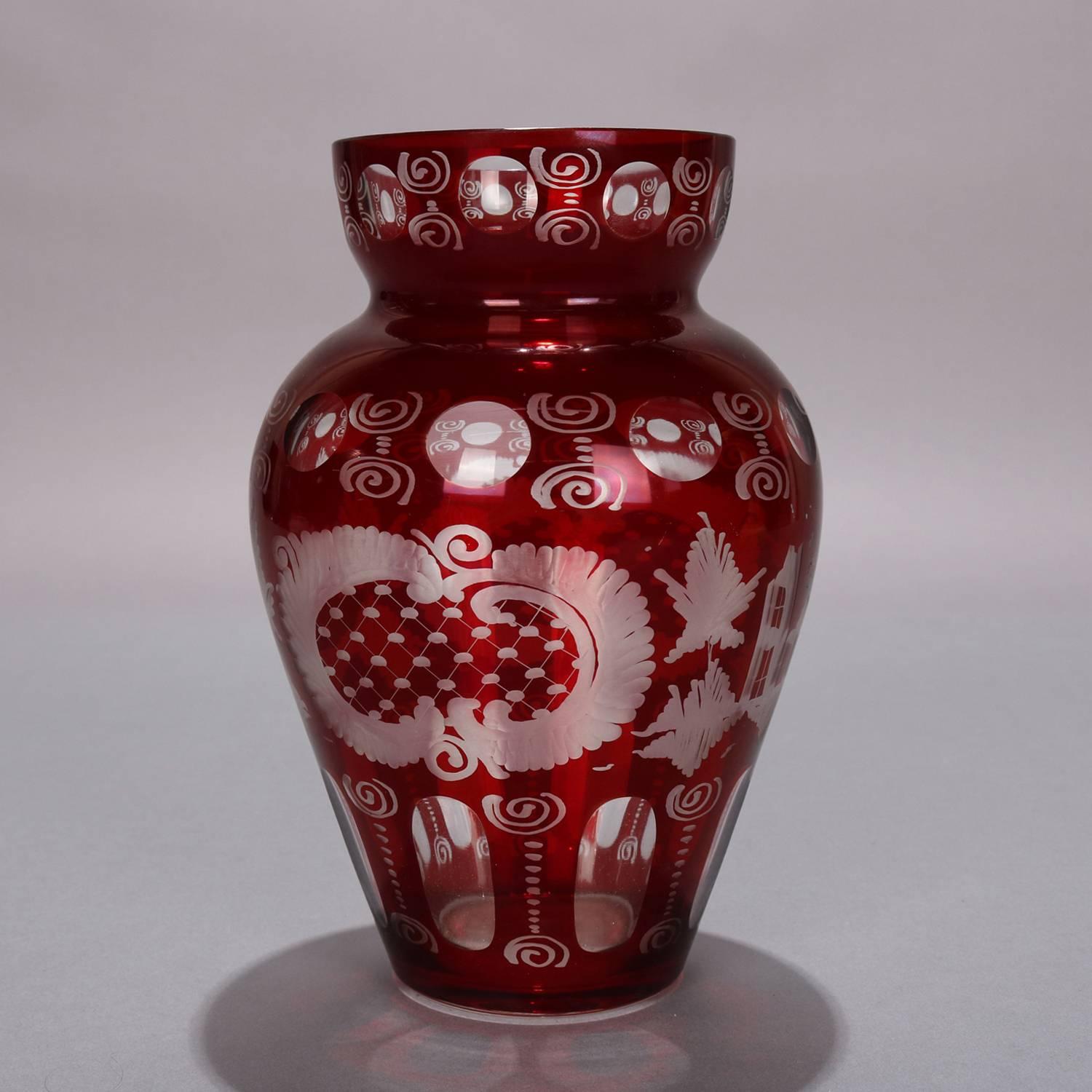 Antique Czech Bohemian Egermann cranberry ruby cut to clear vase features stag and castle hunt scene with swirl and thumbprint decoration, circa 1880


Measures: 8.5