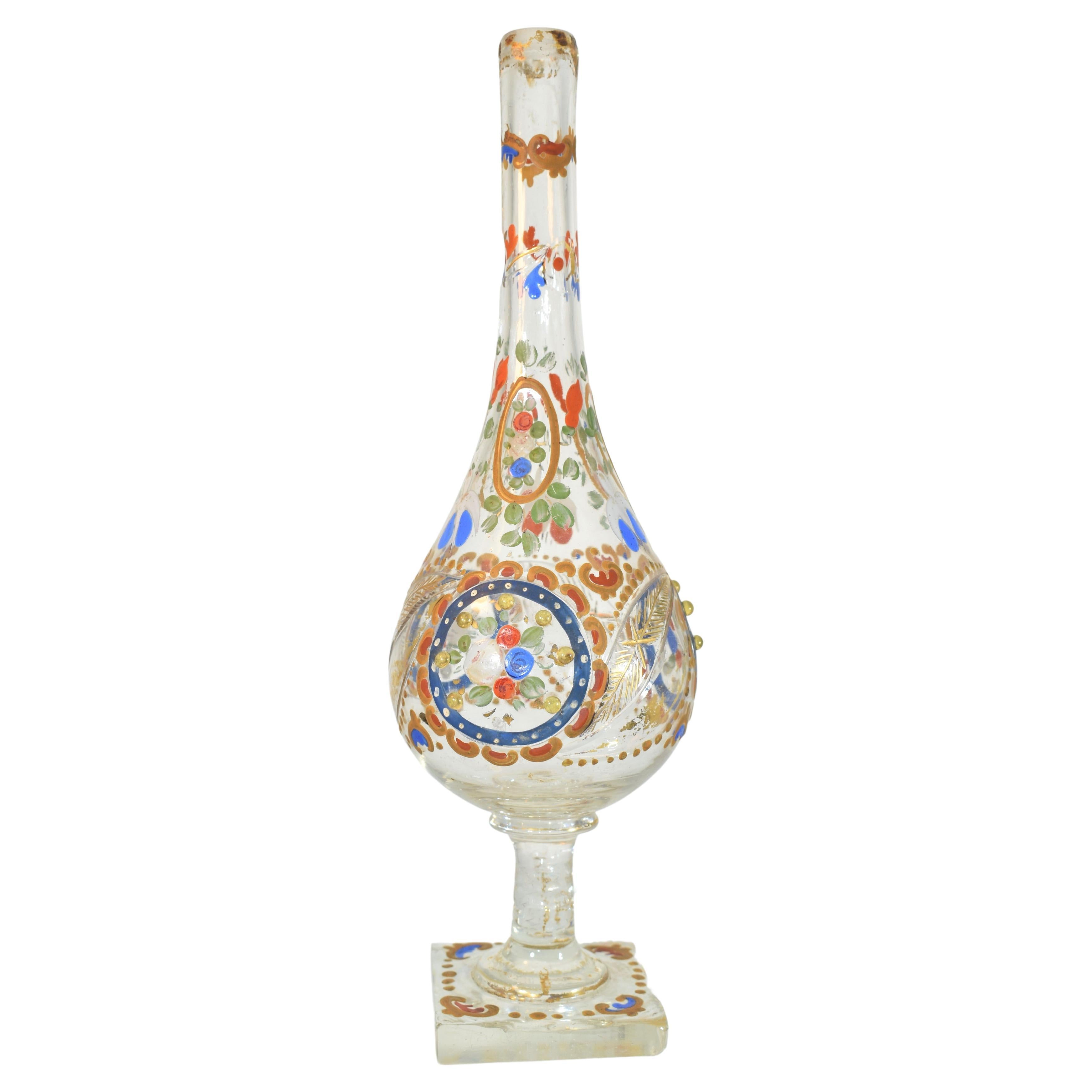 Antique islamic rose water sprinkler
19th Century, cut and decorated with colorful enamel
26 cm high.