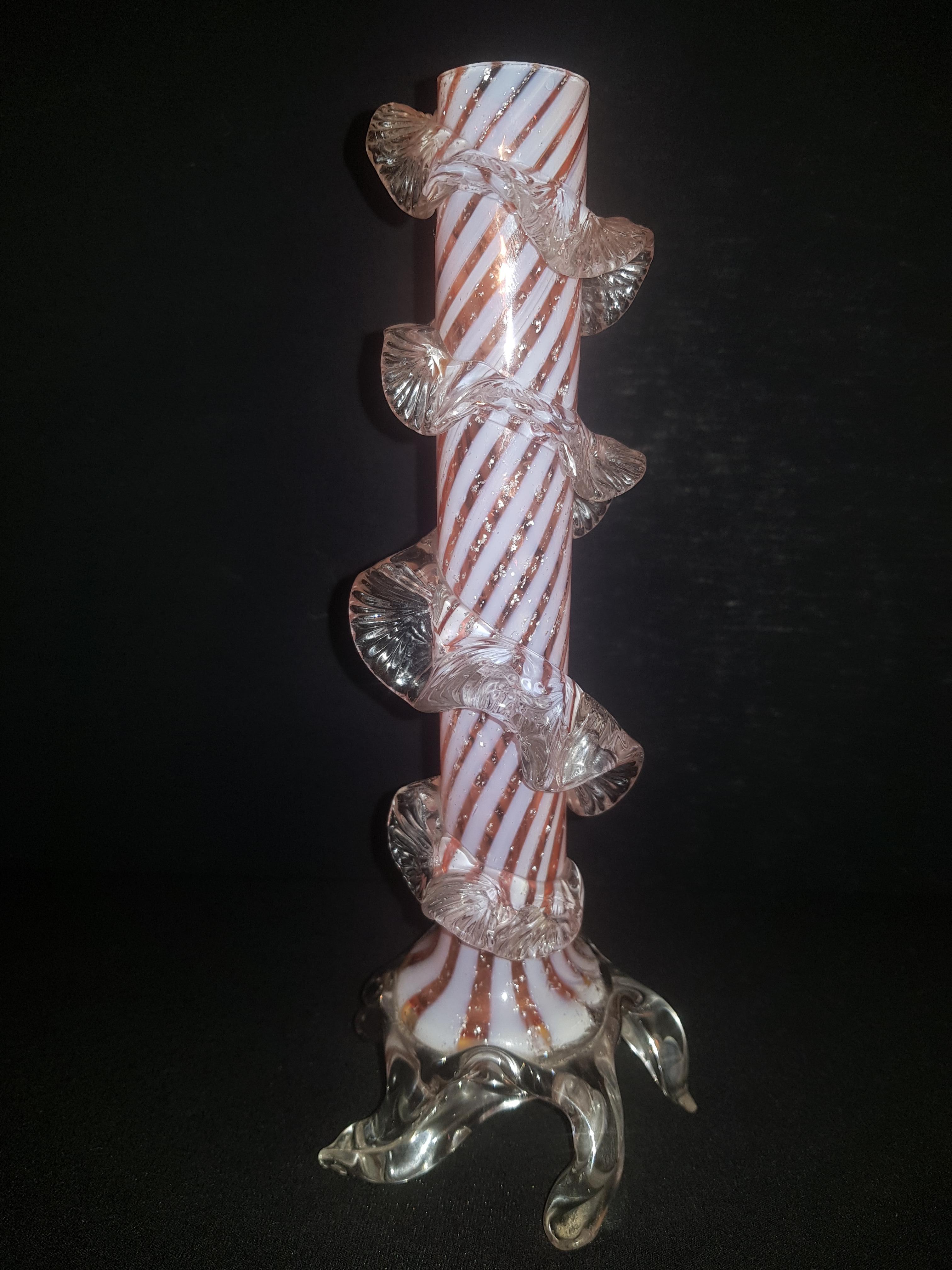 Beautiful antique bohemian swirled glass candle holder in red and white with silver leaf by Franz Welz, years 1900-1910. In excellent condition.