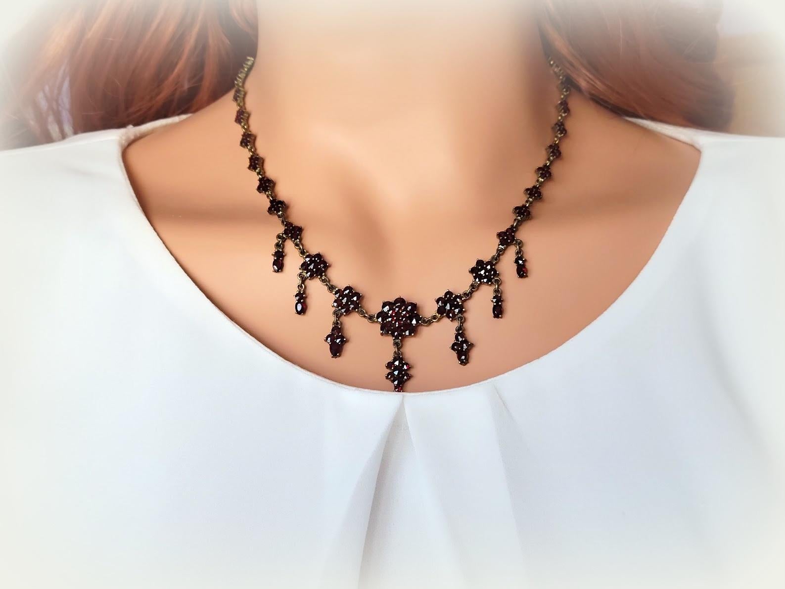 Bohemian garnet jewelry dates back to the 19th century. During this time, garnets were one of the most popular gems used in jewelry production. 

The elegant example of bohemian garnet jewelry from the Victorian era. This fabulous festoon-style