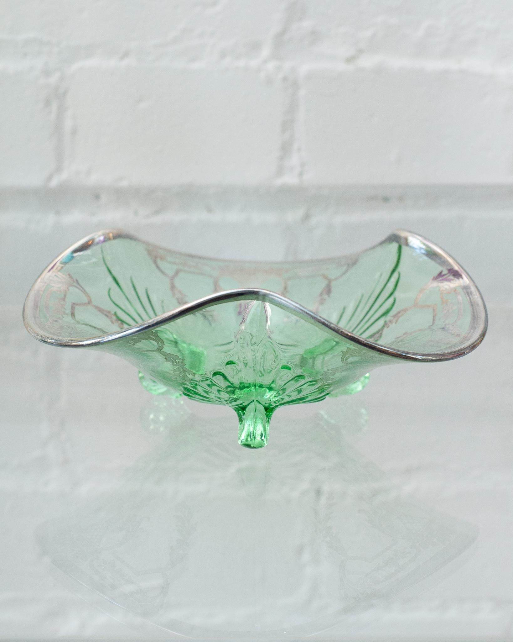 A beautiful antique Bohemian blown green glass tray with sterling silver overlay.