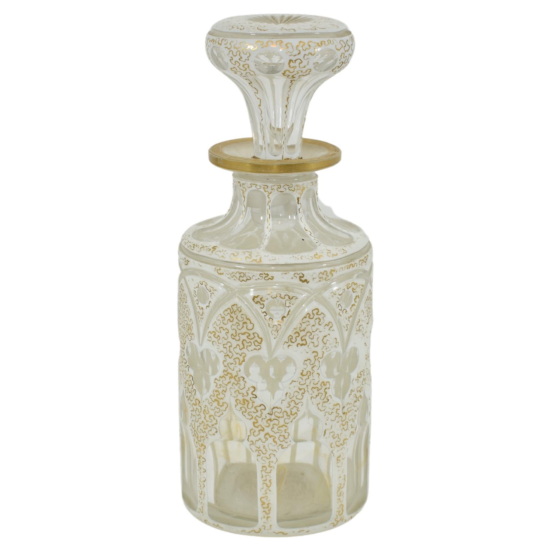 Antique perfume bottle with stopper
transparent glass with milky white cut opaline glass overlay
hand-painted all arround with gold enamel decorations
Bohemia, 19th century.