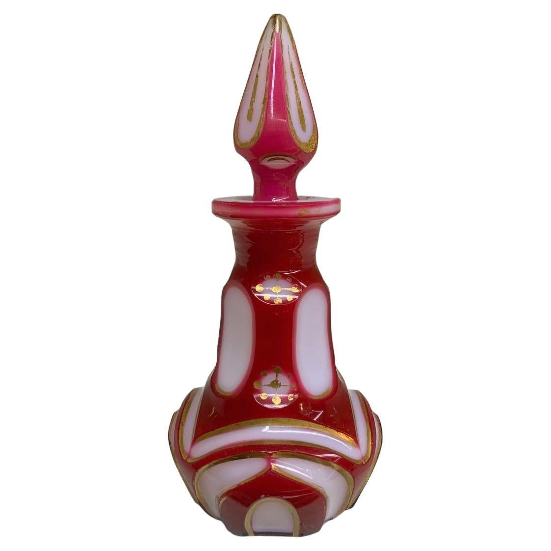 Antique Bohemian Opaline glass perfume bottle

White Opaline Alabaster Glass with Red Overlay

Beautifully Cut and Decorated with Gilding Highlights

Bohemia, 19th Century.