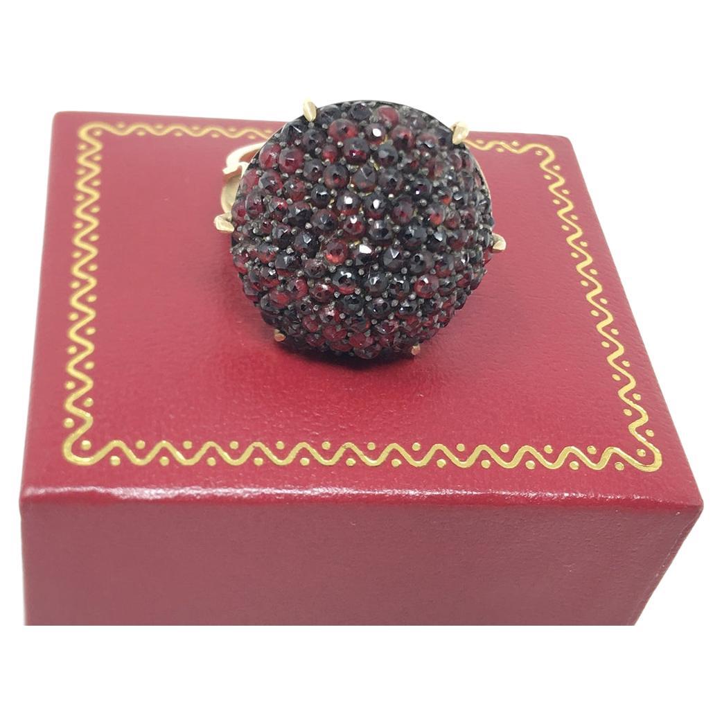 Antique Garnet 14KT Gold “Bomb” Ring. Gorgeous dome shape - set garnets on a fine 14KT gold setting most likely set in the early-mid 20th century. 
This ring is beautiful when viewed in daylight. Women’s Size:  7.50  Very nice condition.  Ring can