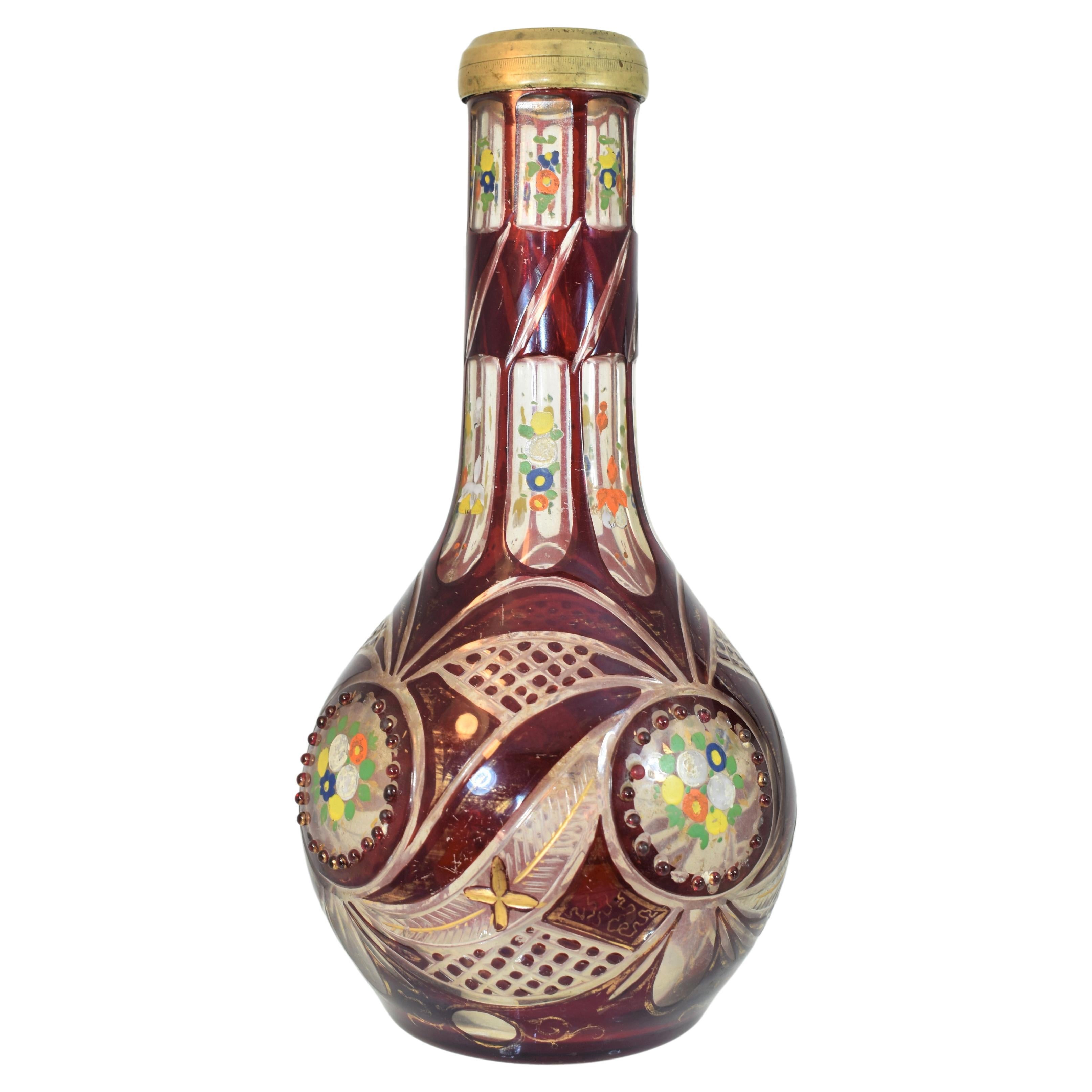 A beautiful ruby hookah base, overlayed cut glass
decorated with jewels and gilded enamel.
Bohemia, 19th Century, produced for the islamic market.