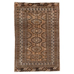 Antique Bokara Rug with Repeating Tribal Gül Pattern in Camel
Espresso Antique Bokara Rug with Repeating Tribal Gül Pattern in Camel
Espresso