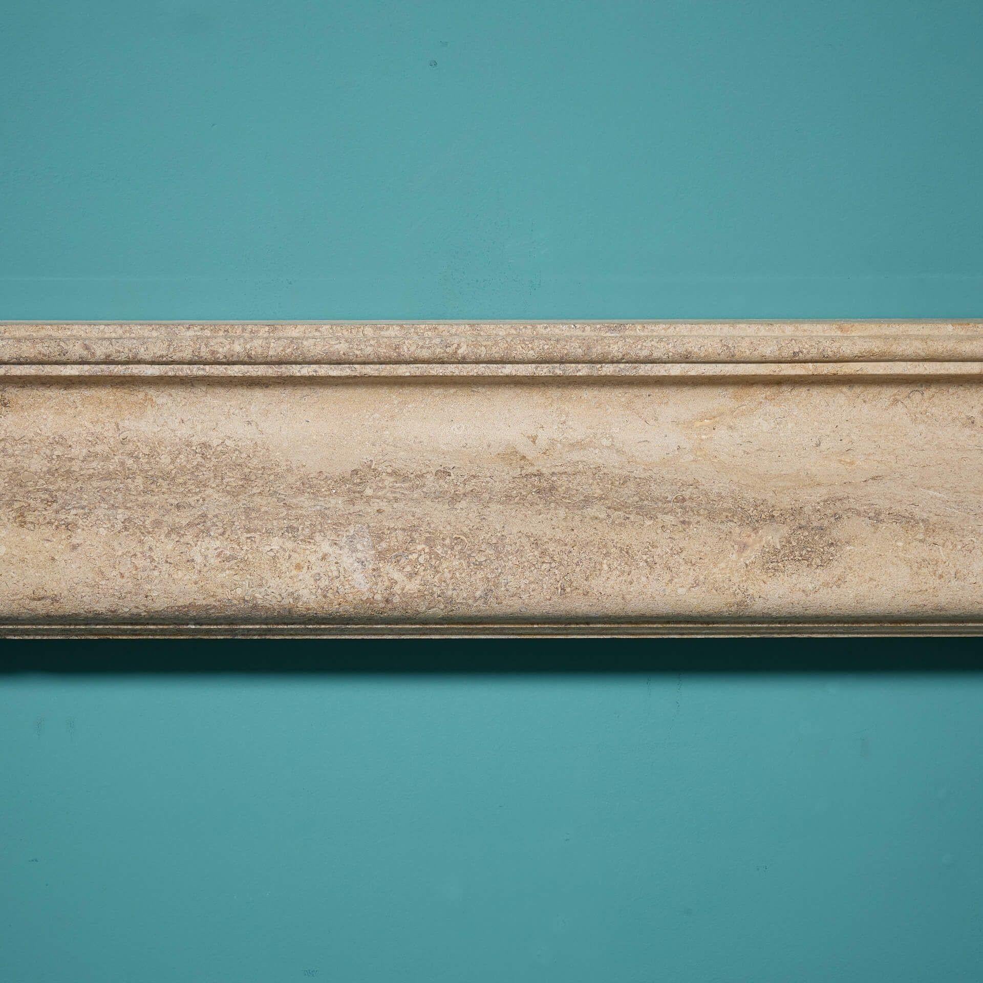 Hand-Crafted Antique Bolection Style Fossilised Limestone Fire Mantel For Sale