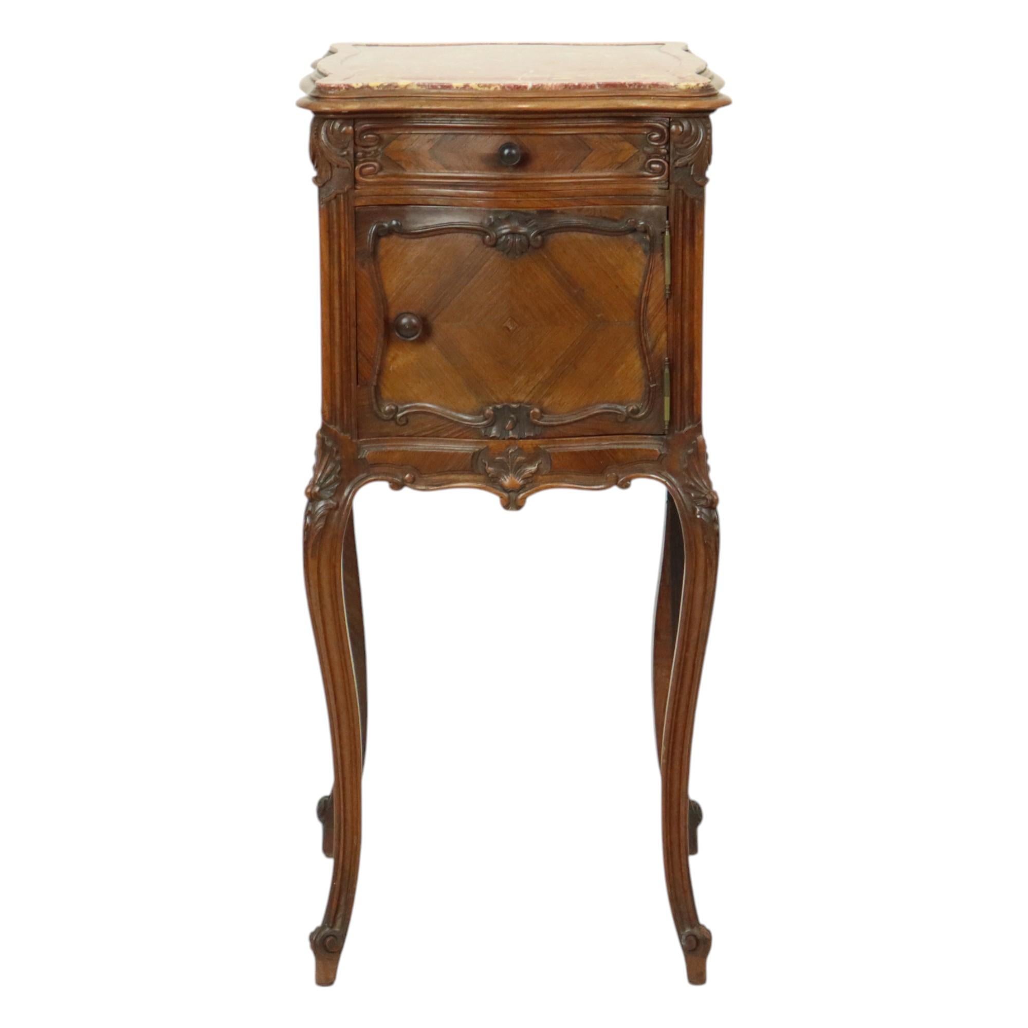 Beautiful antique bedside table of very high quality, curved bedside table made of (probably) oak and walnut with red marble top, graceful carved acanthus decoration and elegant legs, completely in Louis XV style, circa 1890, France.

This bedside