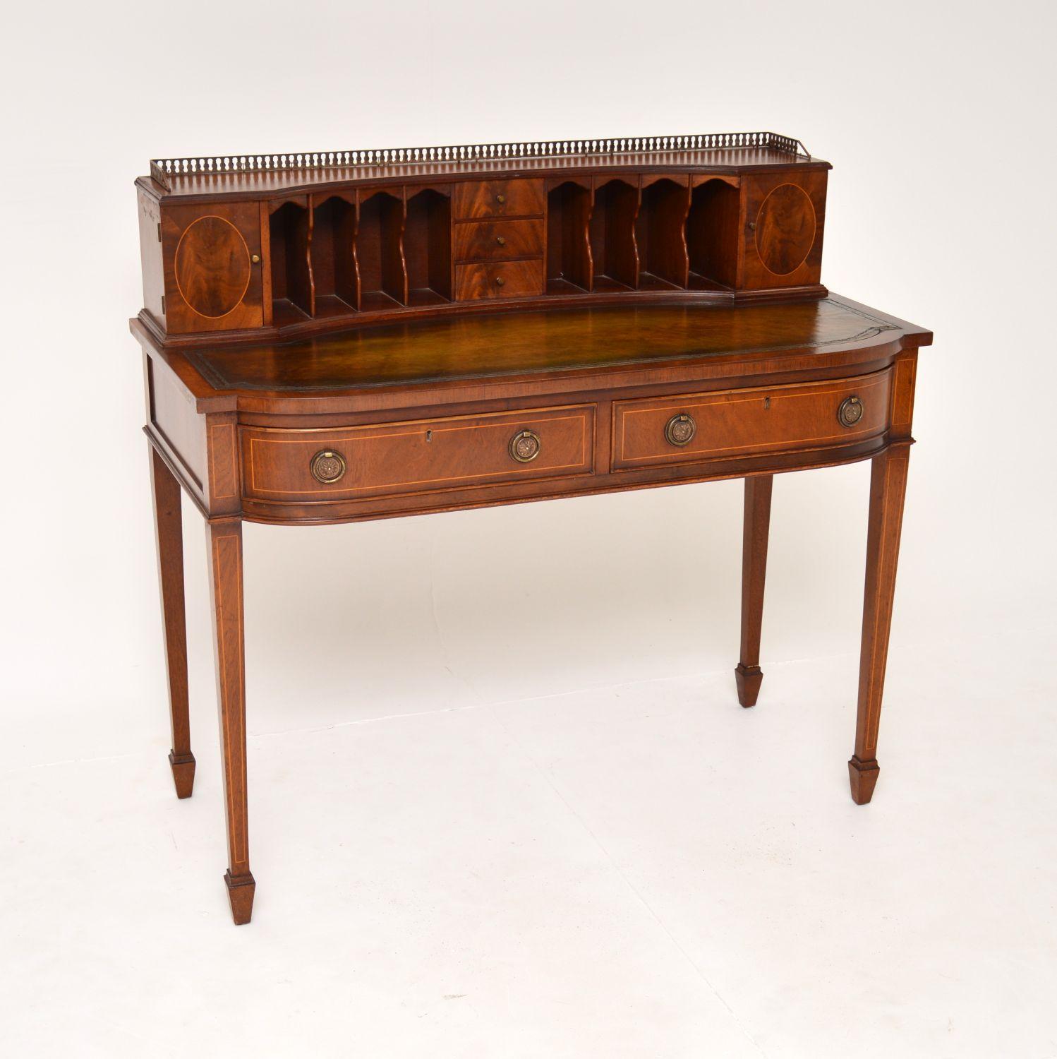 A lovely antique Sheraton Style bonheur du jour writing table in wood. This was made in England, it dates from around the 1930’s.

It is of fantastic quality and is beautifully made. The wood has satin wood inlay around all the edges, this has