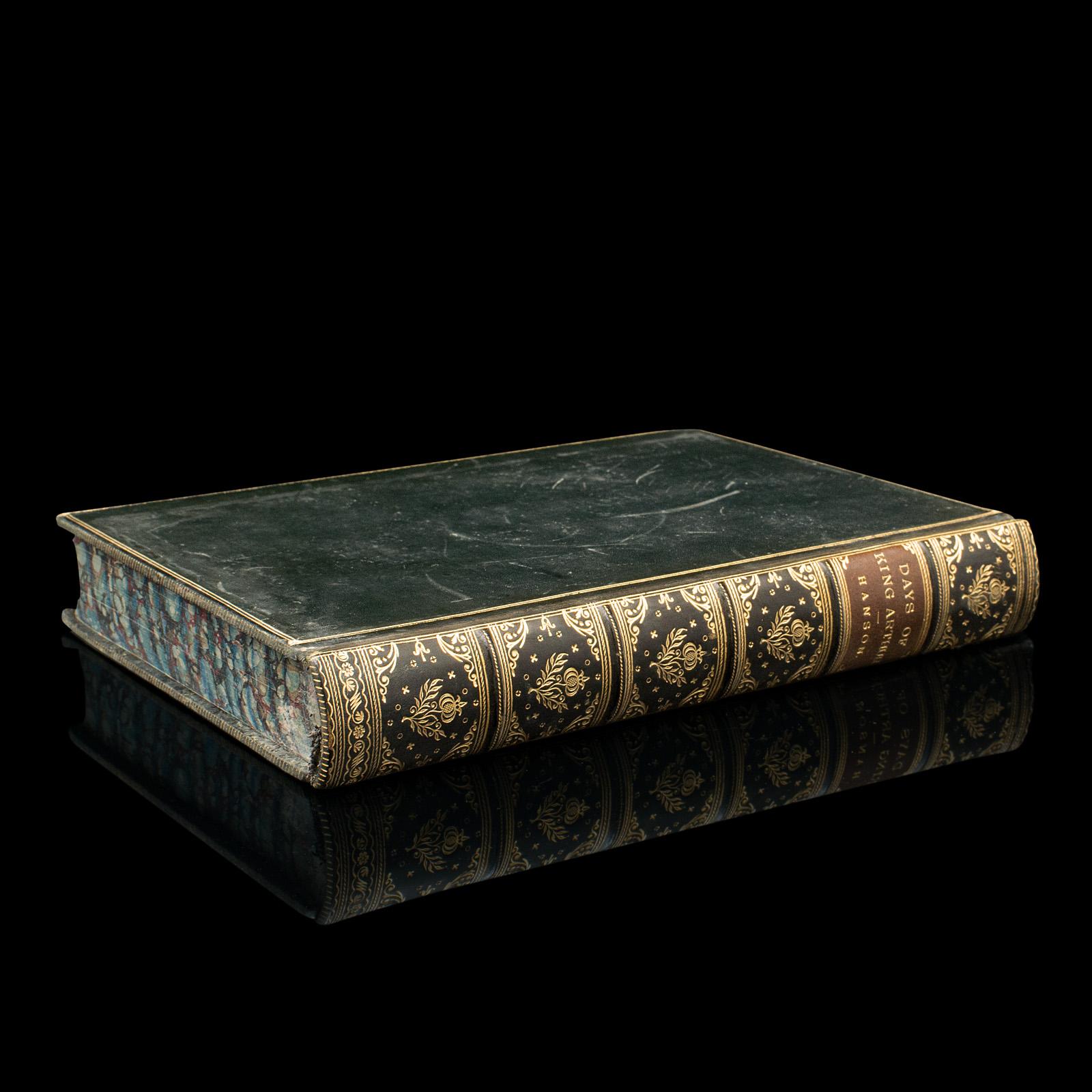 This is an antique mythology book, Days of King Arthur by Charles Henry Hanson. An English language, hard bound fictional work with illustrations by Gustave Doré, dating to the late Victorian period, published 1887.

Known for his retelling of