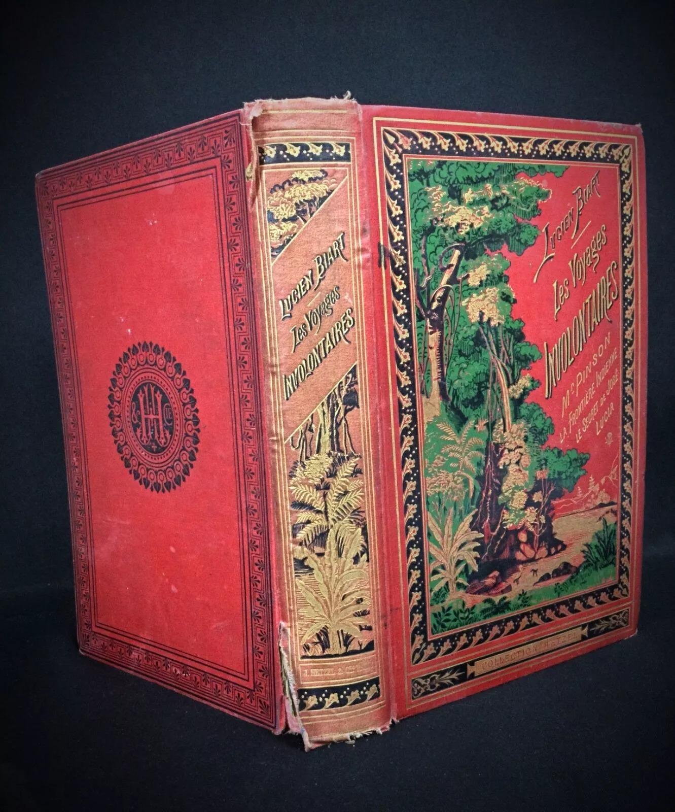 This antique book, Les Voyages Involontaires by Lucien Biart, is in good condition, sold in its original state. The cover shows slight wear and minor tears, while the pages have yellowed slightly with some foxing spots. Please refer to the photos