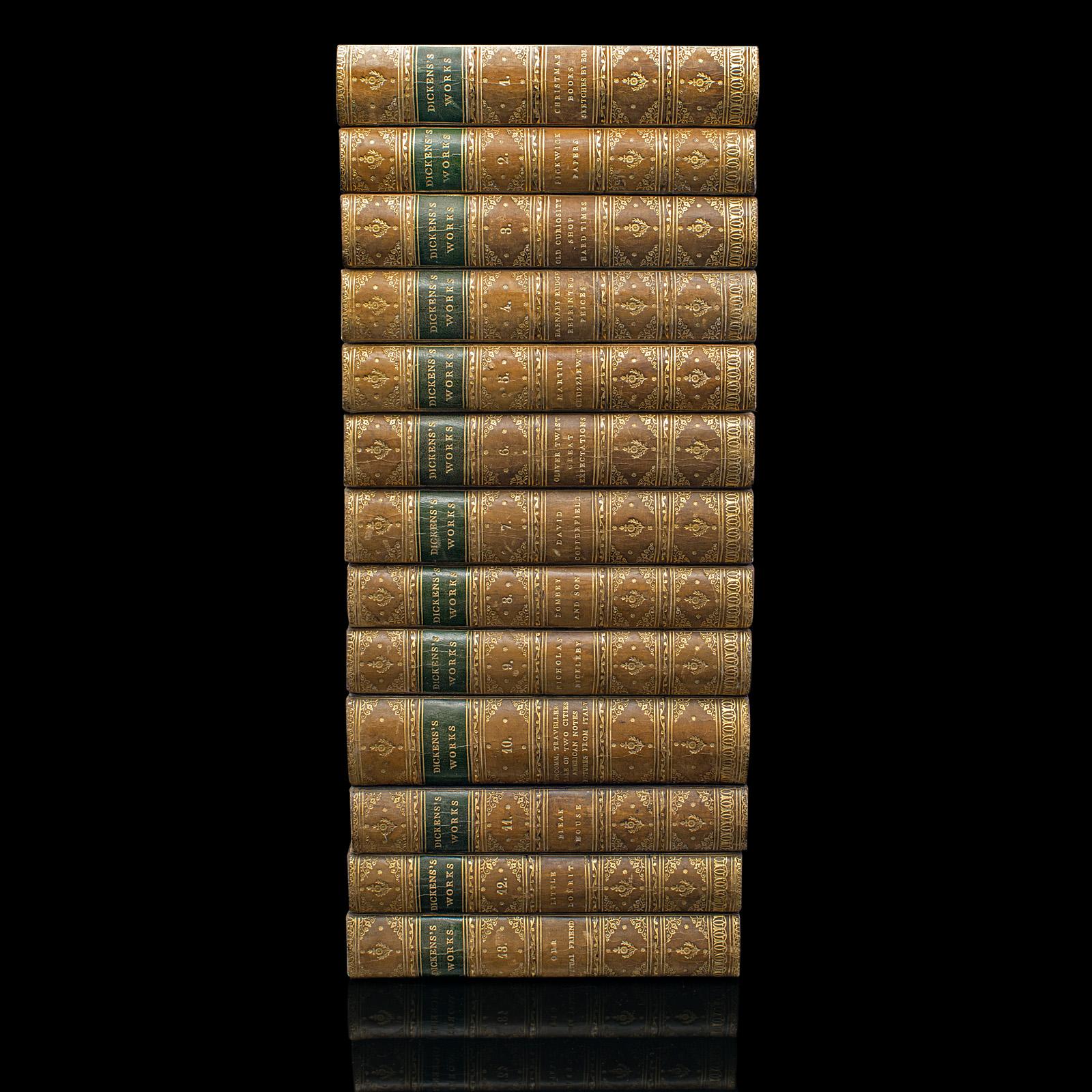
This is an antique set of 13 Charles Dickens novels. An English language, comprehensive library of fiction books, dating to the Victorian period, published 1866 to 1868.

Synonymous with the social fabric of Victorian England, Charles John Huffam
