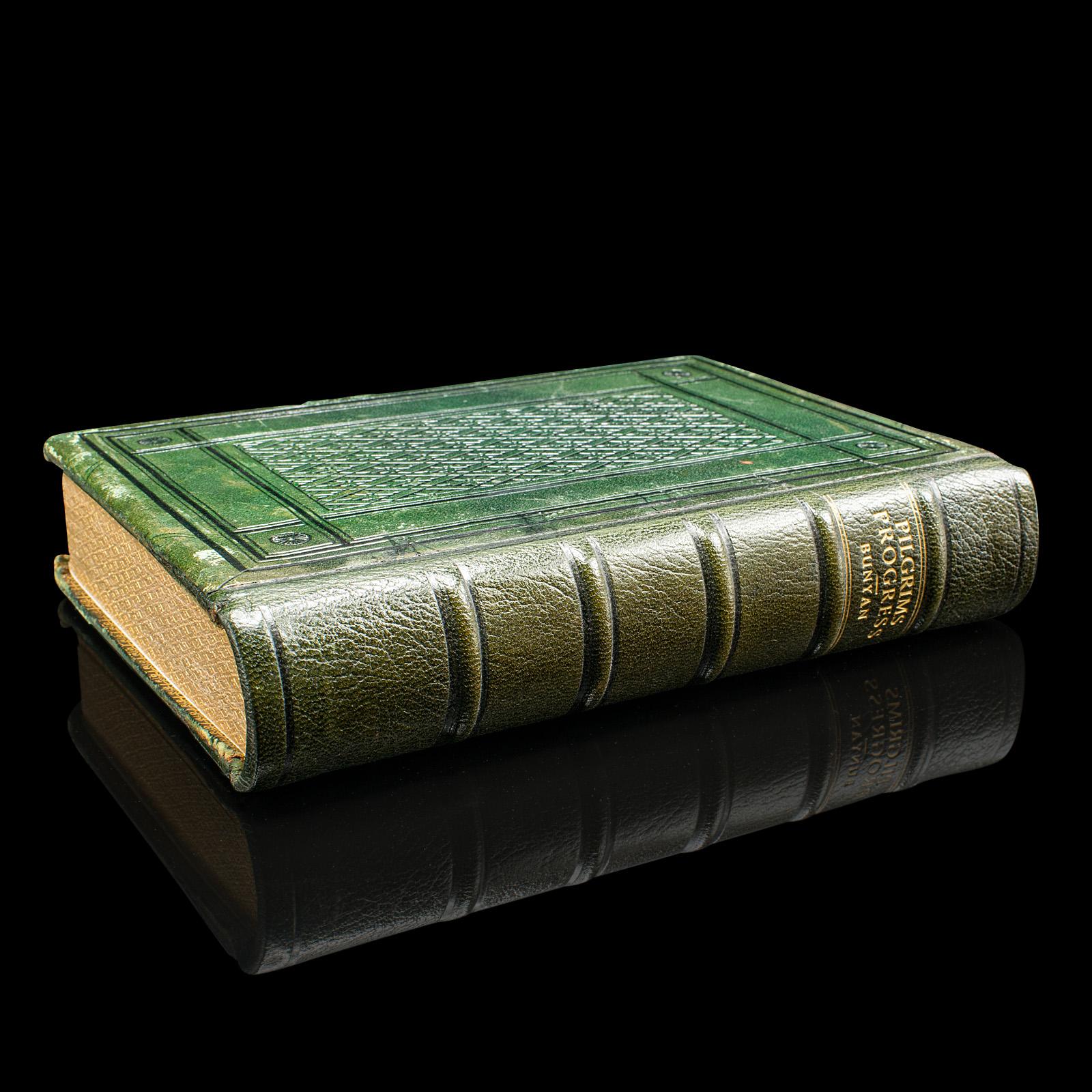 
This is an antique book 'The Pilgrim's Progress' by John Bunyan. An English, bound and illustrated novel, dating to the Victorian period, circa 1860.

A Christian allegory - and never out of print - The Pilgrim's Progress was written in the 17th