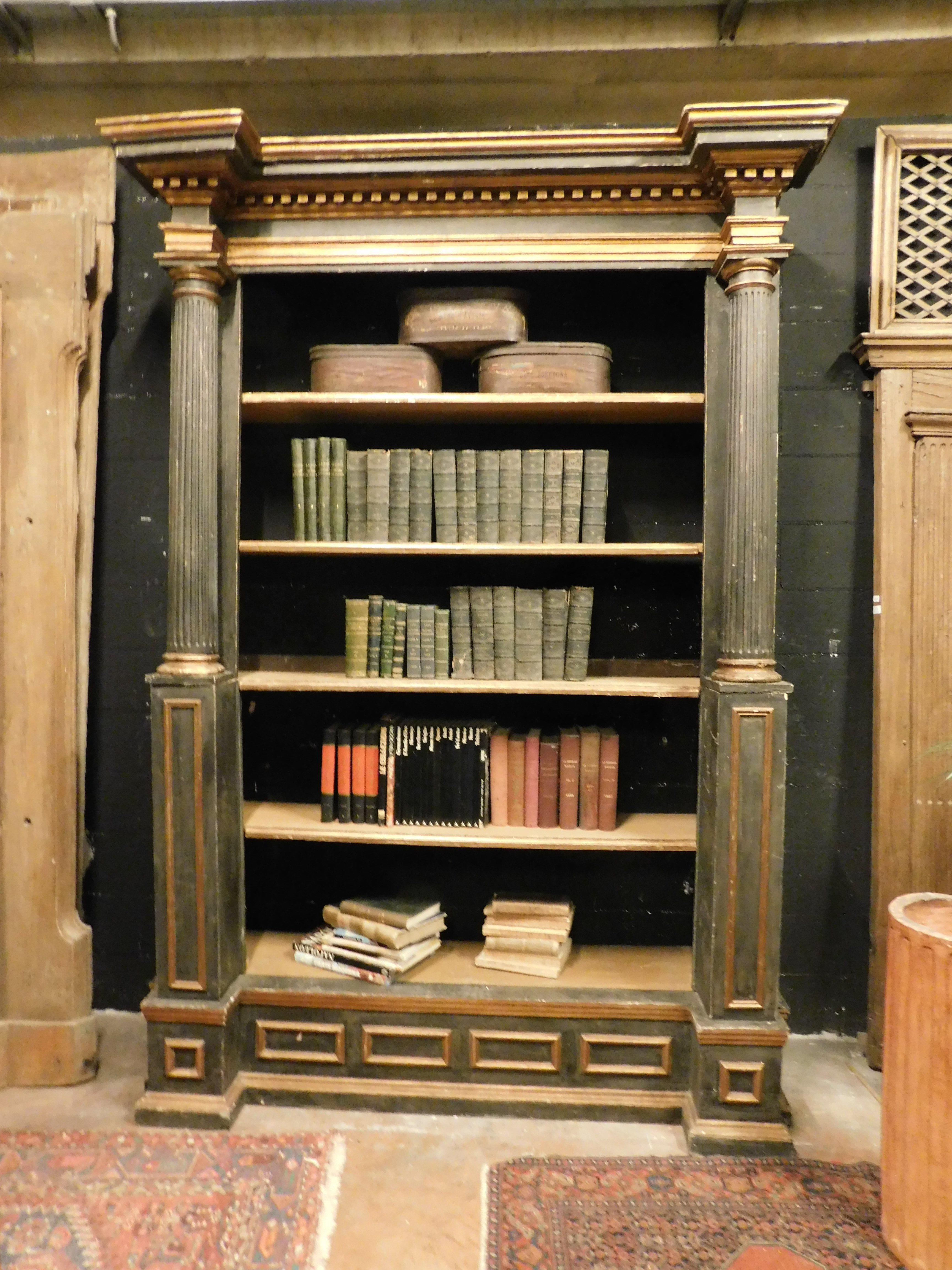 Ancient and beautiful open bookcase, built in black lacquered solid wood with gold details, with classic sculpted columns, built in the late 18th century in Italy.
Very charming and of great value, ideal in terms of size, adaptable to any interior,