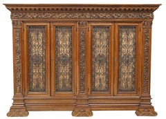 Antique Bookcase Italian Renaissance Revival, Carved Walnut, Iron Doors, C 1900