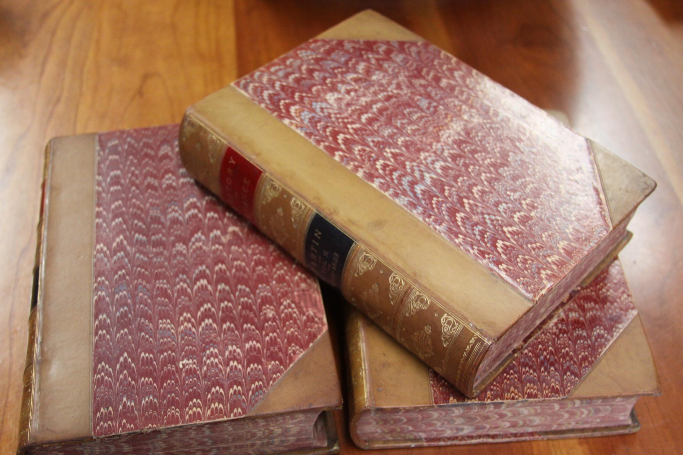 Antique books. Three volumes. A popular history of France. Published: Boston, by C.F. Jewett Company 1878. Fully illustrated. Bound in three quarter tan calf, marbled boards, floral gilt decorations to spine red and black title labels marbled