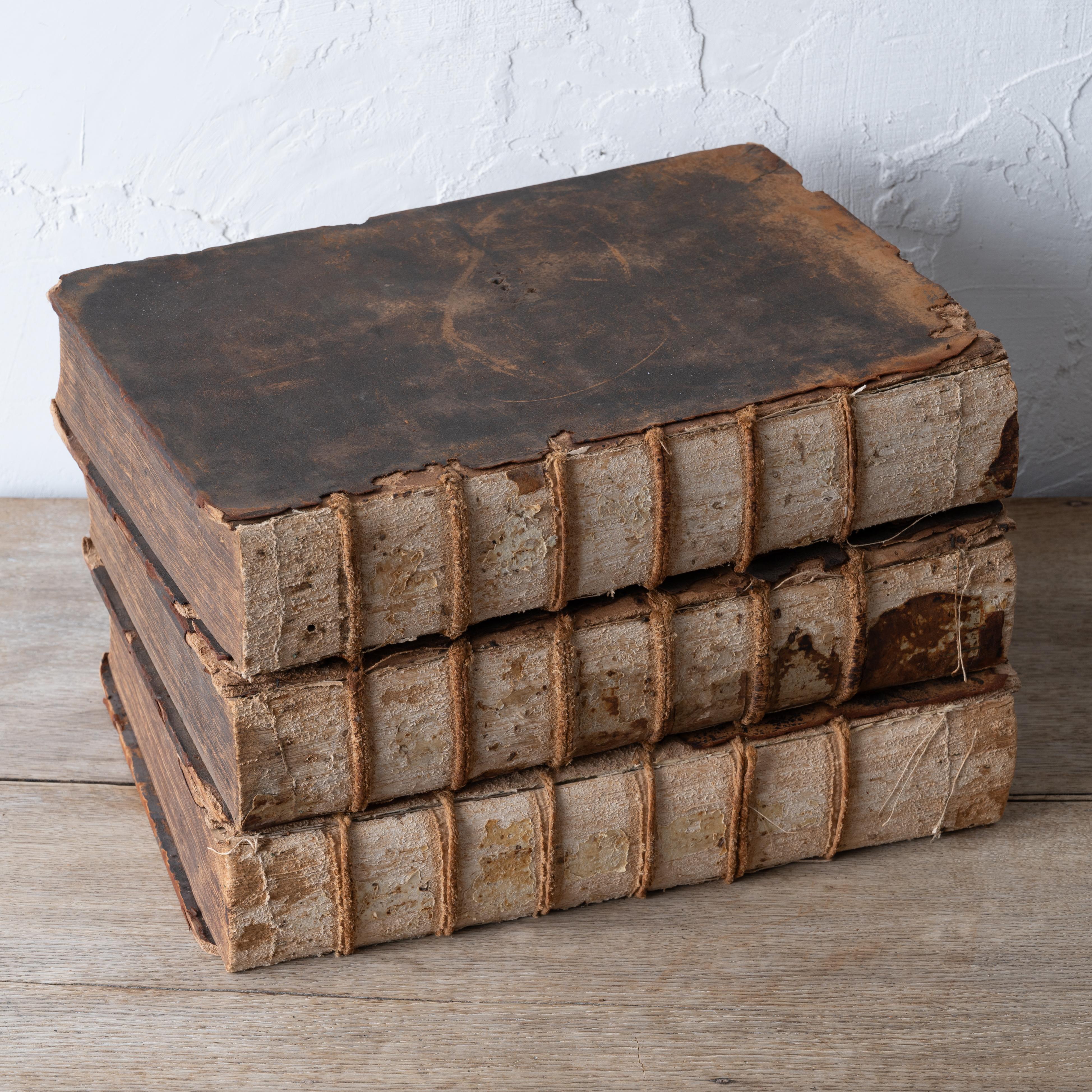 Pierre Bayle's Dictionnaire Historique et Critique published in Rotterdam 1715, third edition.

Measured as stacked: 15 ¼ inches wide by 10 ¾ inches deep by 9 ½ inches tall; each book just over 3 inches wide