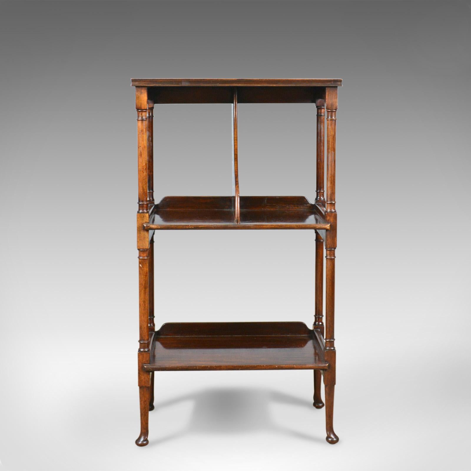 This is an antique bookshelf, an English, mahogany, three-tier, Regency revival whatnot display stand dating to the late 19th century, circa 1890. 

Delightful, rich, russet tones to the select mahogany
Good consistent color in the wax polished