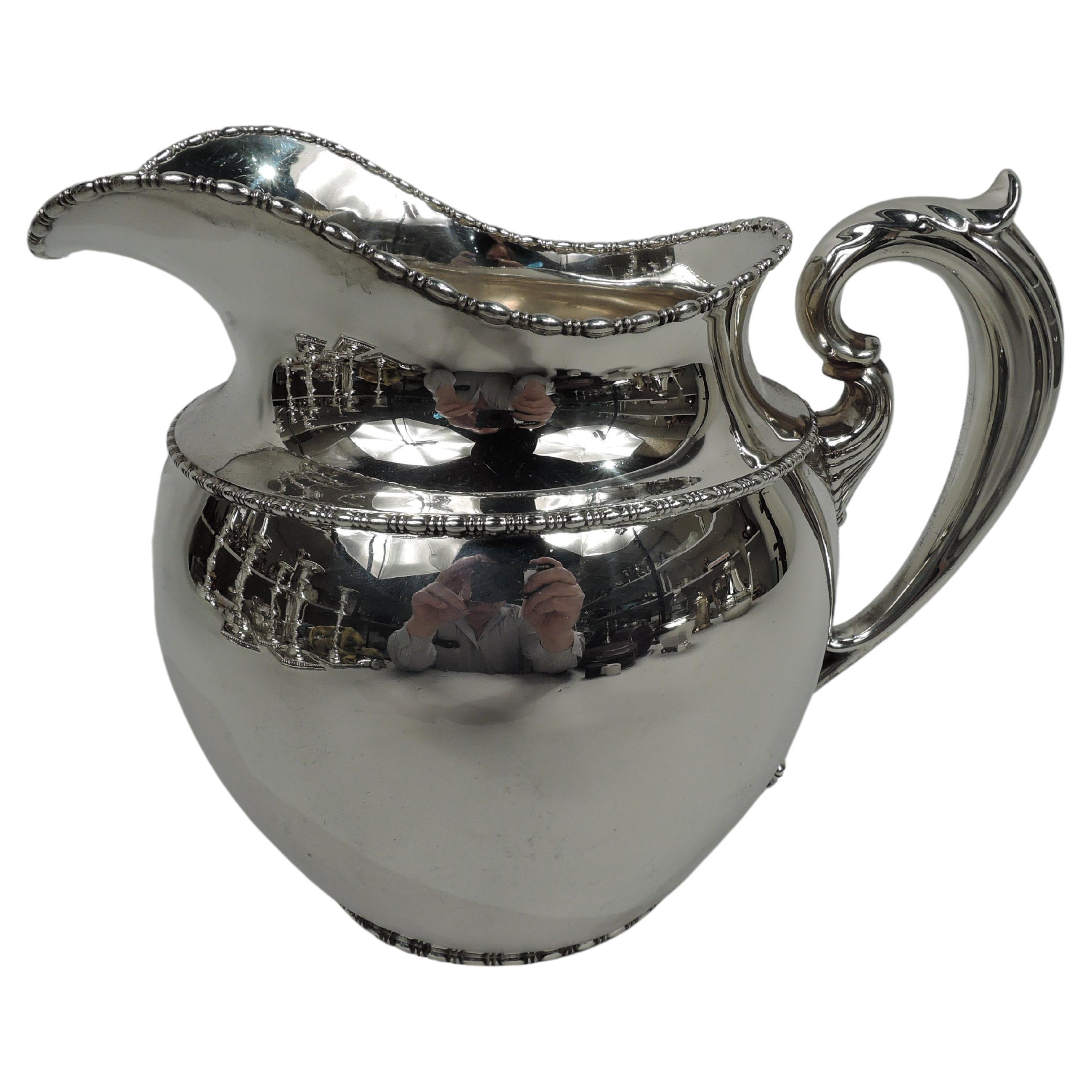 Antique Boston Edwardian Classical Sterling Silver Water Pitcher For Sale