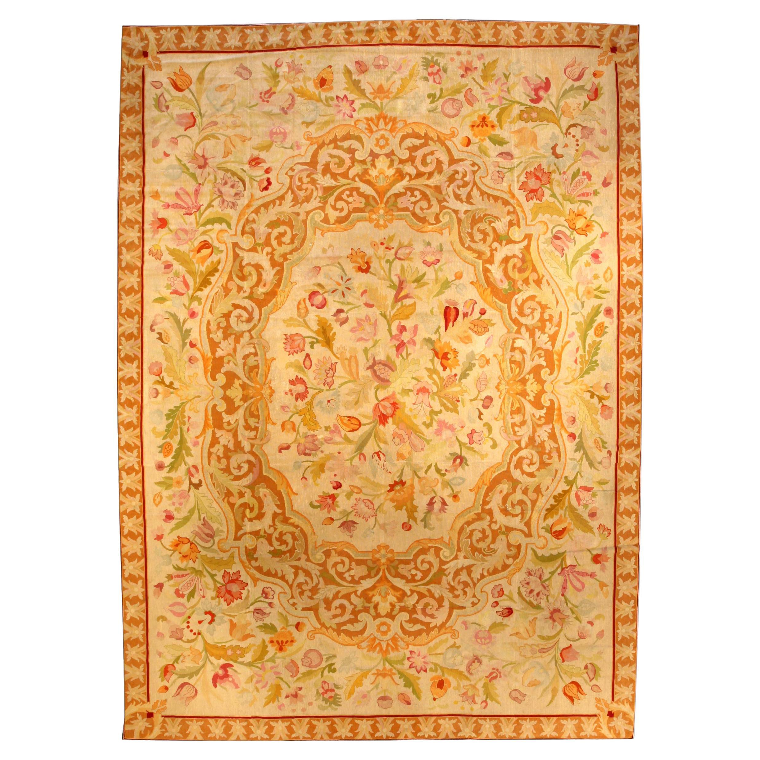 Tapis antique orange botanique à l'aiguille