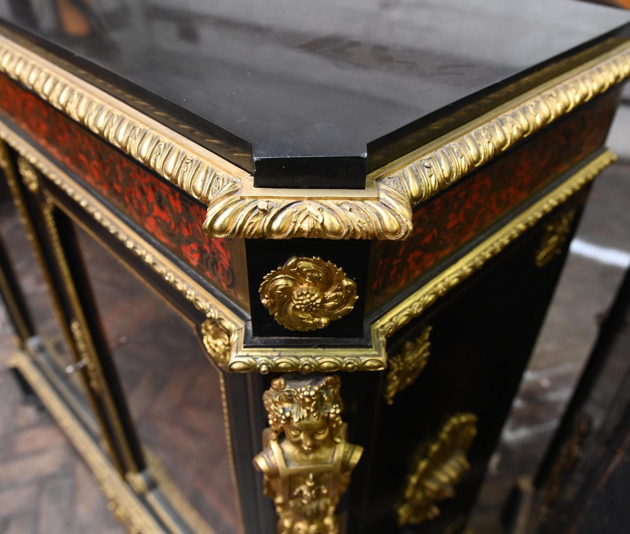 You are viewing a gorgeous French cabinet or vitrine with Boulle style inlay work
Circa 1860 the cabinet is well crafted and features a marble top that is smooth and chip free
Ormolu fixtures are original
Purchased from a dealer on Marche Biron at