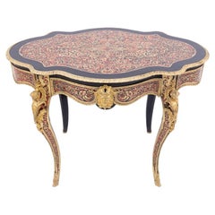 Table ancienne de style Boulle, France, milieu du 19e siècle.