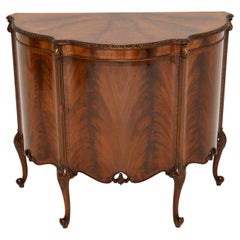 Antique Bow Front Cabinet by Maple 
Co.