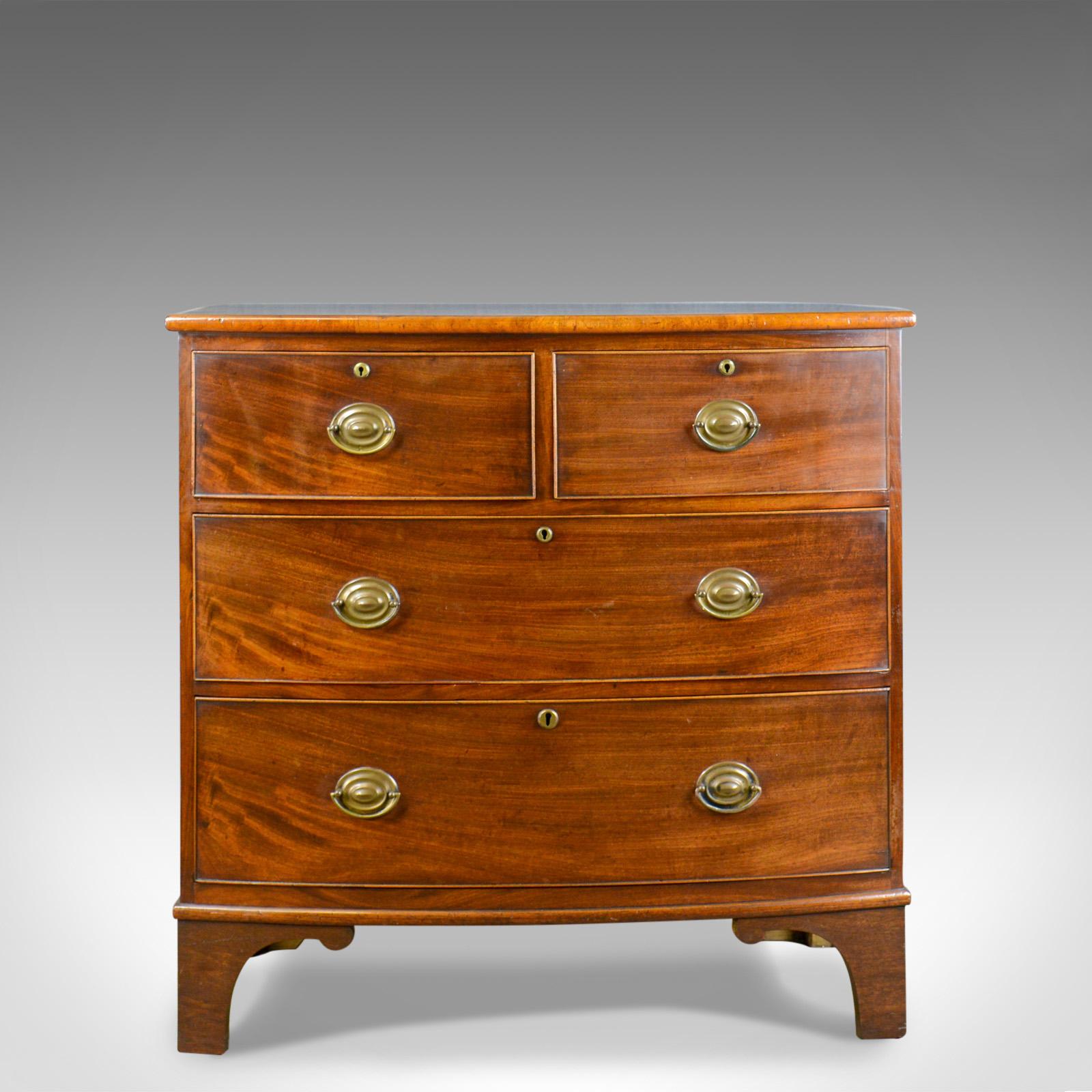 This is a Fine example of an antique bow front chest of drawers. An English, Georgian, mahogany chest dating to the late 18th century, circa 1790.

In quality mahogany with attractive grain and good color
Useful shallow proportions arranged in a