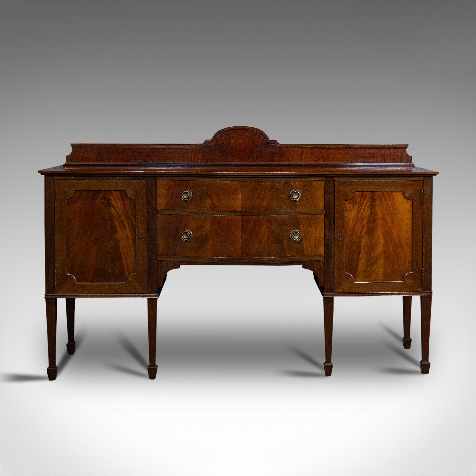 This is an antique bow front sideboard. An English, mahogany dresser cabinet, dating to the Victorian period, circa 1880.

Superb Victorian appeal
Displays a desirable aged patina
Presenting quality mahogany with fine grain interest
Rich russet