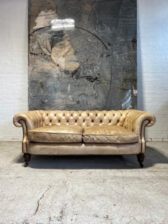 Antique Bow Fronted 19thC Chesterfield Sofa in Hand Dyed Parchment Leather