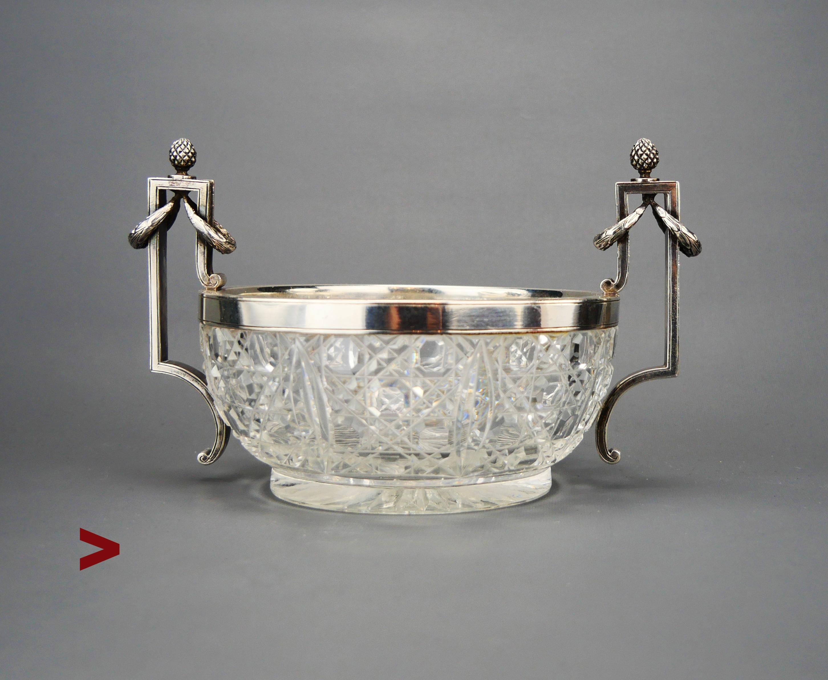 Fine Faberge solid Silver and cut crystal glass Bowl in Empire / Neoclassical style

Measurements:  Ø 11.5 cm x 10 cm high.  Weight: 440 grams

Hidden in the ornaments Russian Imperial standard hallmarks confirming solid Silver 84 alloy, 1896 -1908