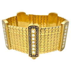 Bracelet ancien en or 18 carats, perles naturelles et émail avec motif de clé grecque, France