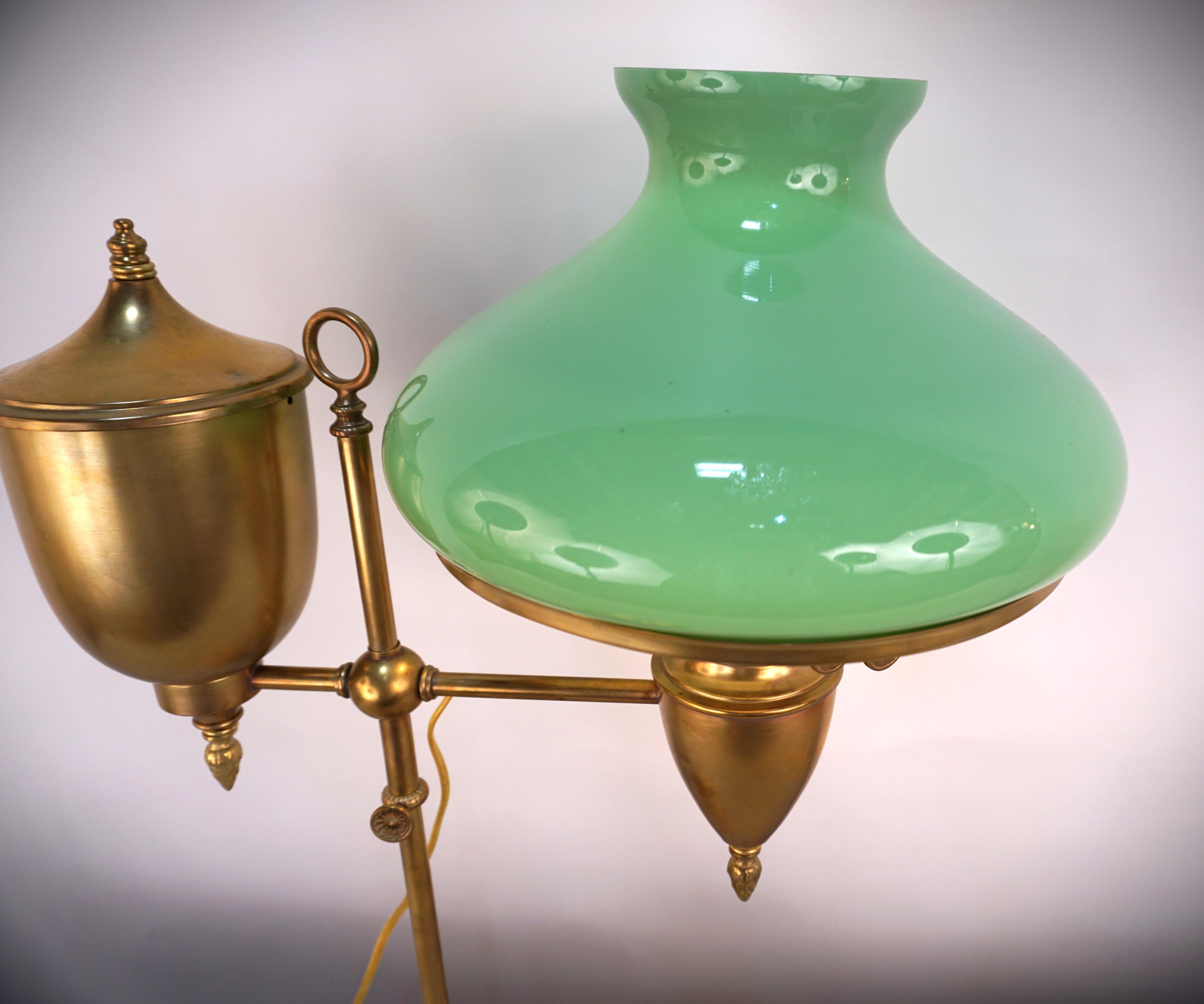 Electrified adjustable height Bradley & Hubbard brass oil lamp with rare mint green glass shade.