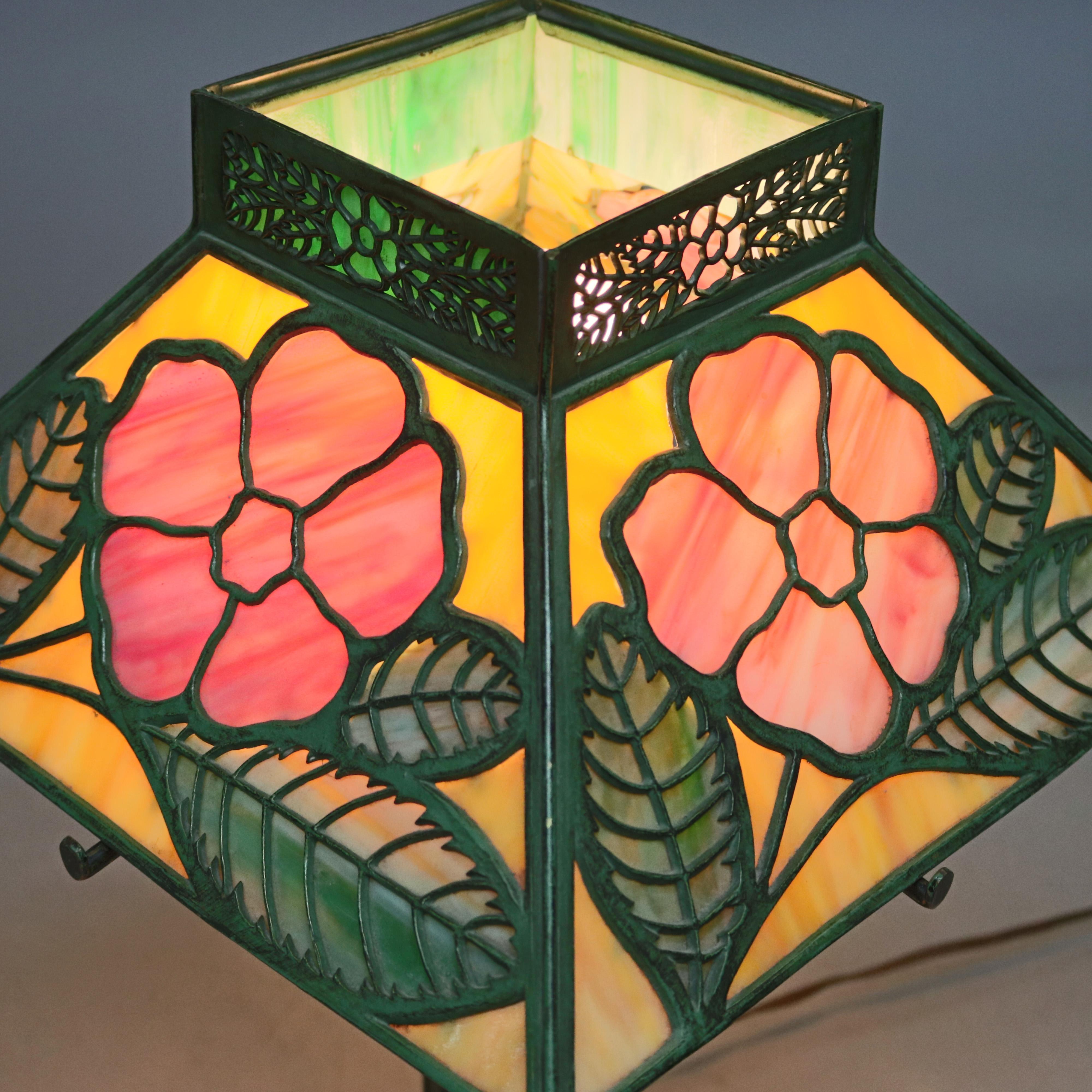 Antique Bradley & Hubbard table lamp offers floral Murano glass flared shade surmounting single socket base, circa 1920.

Measures: 19