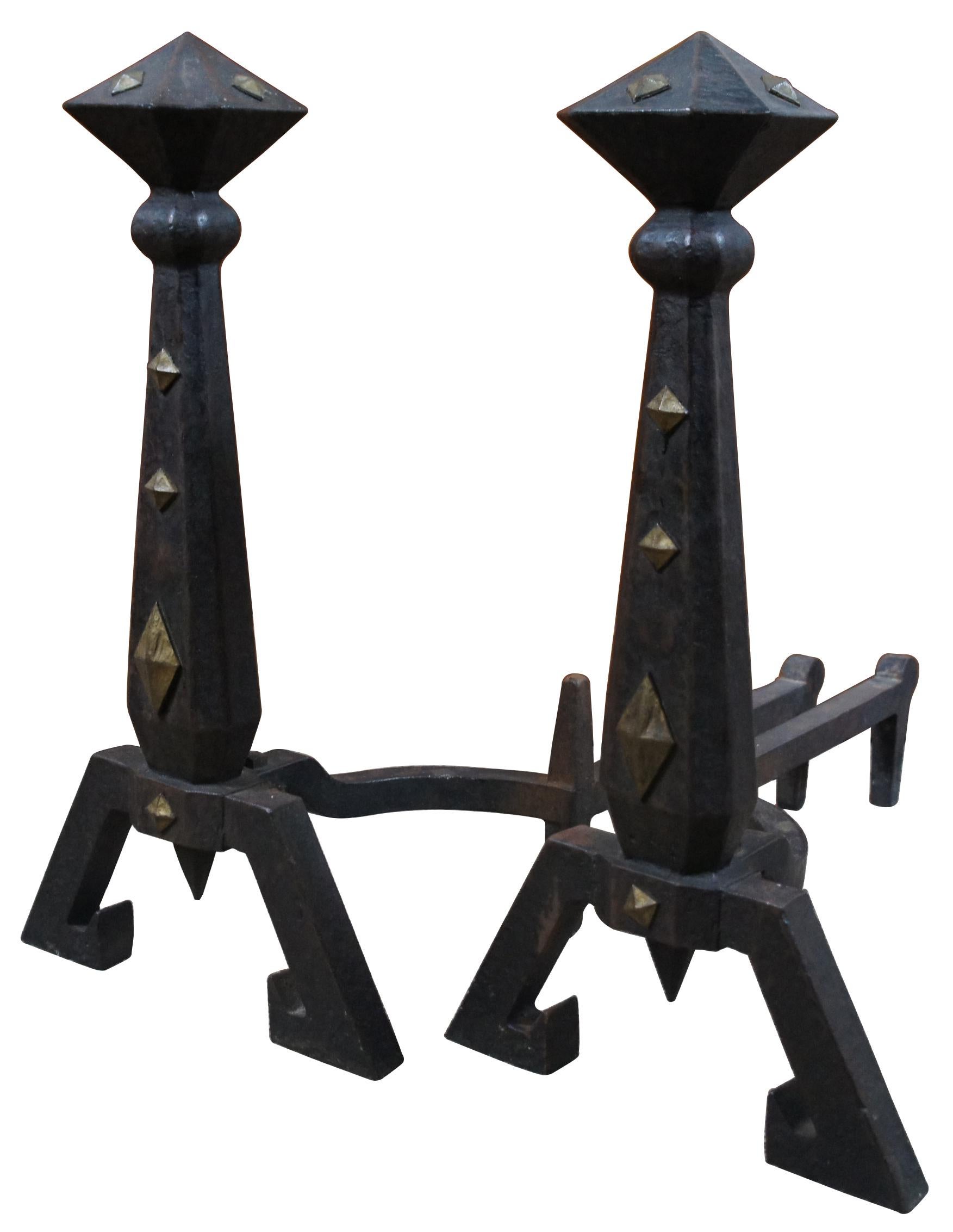 Pair of Arts & Crafts cast iron andirons with brass accents by Bradley & Hubbard Manufacturing Company, circa 1900s. Model 3995.
 
