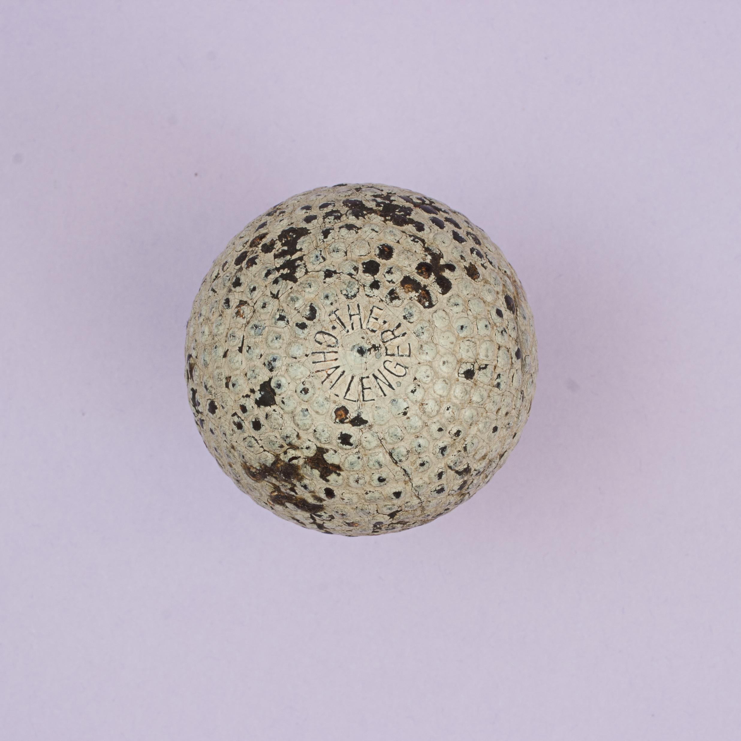 Bramble Pattern Challenger Golf Ball.
A good example of a 'The Challenger' bramble patterned rubber core golf ball. The golf ball is in good condition and is manufactured by Cochrane, first as a gutty and then later as a rubber core ball. The ball